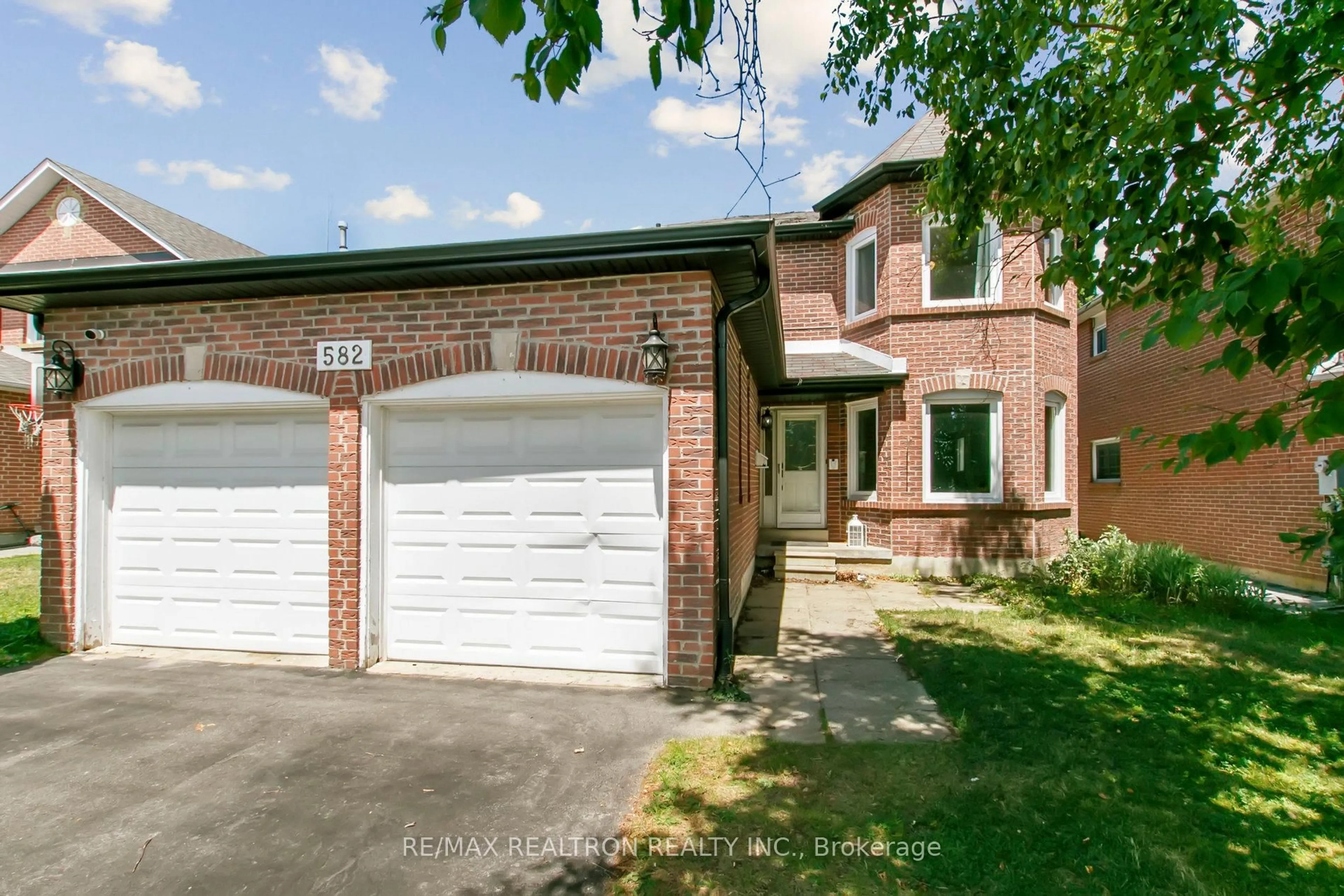 Home with brick exterior material, street for 582 Strouds Lane, Pickering Ontario L1V 4S6