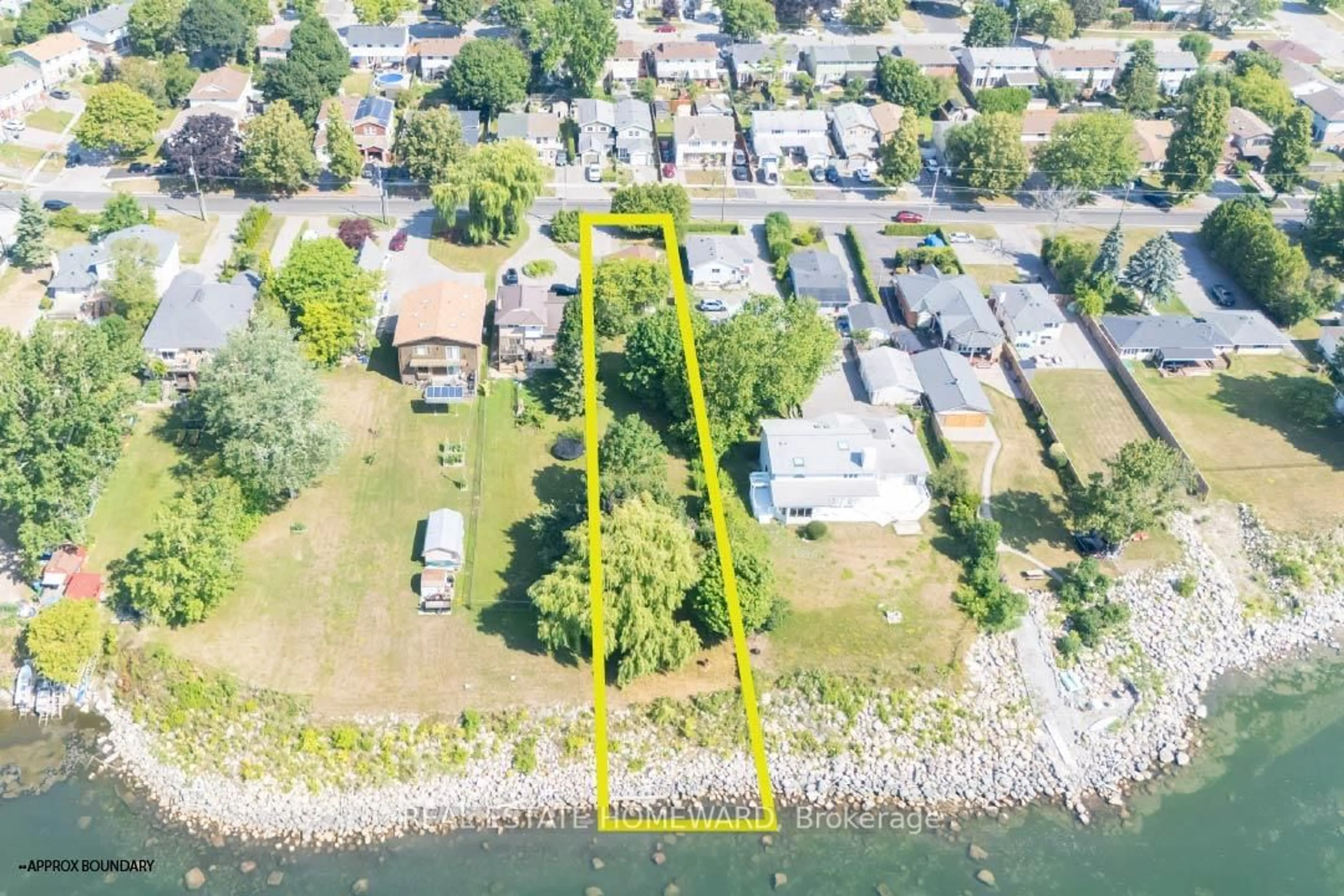 A pic from outside/outdoor area/front of a property/back of a property/a pic from drone, water/lake/river/ocean view for 485 Stone St, Oshawa Ontario L1J 1A4
