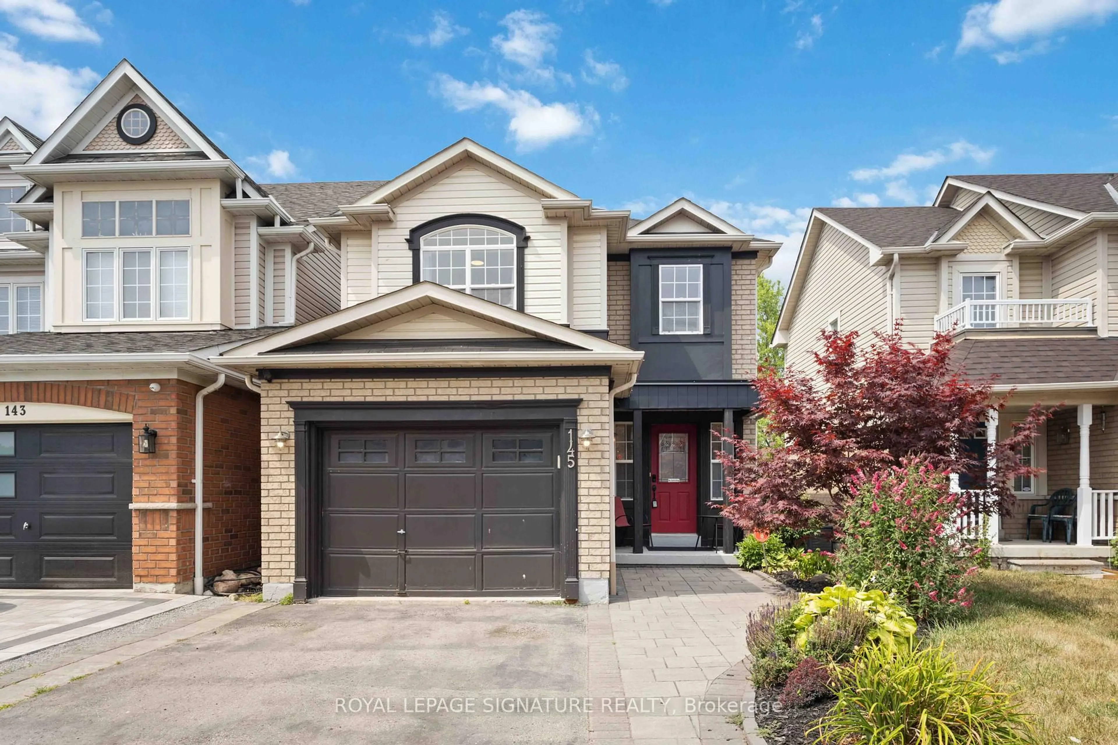 Home with brick exterior material, street for 145 Bourbon Pl, Whitby Ontario L1R 3C6
