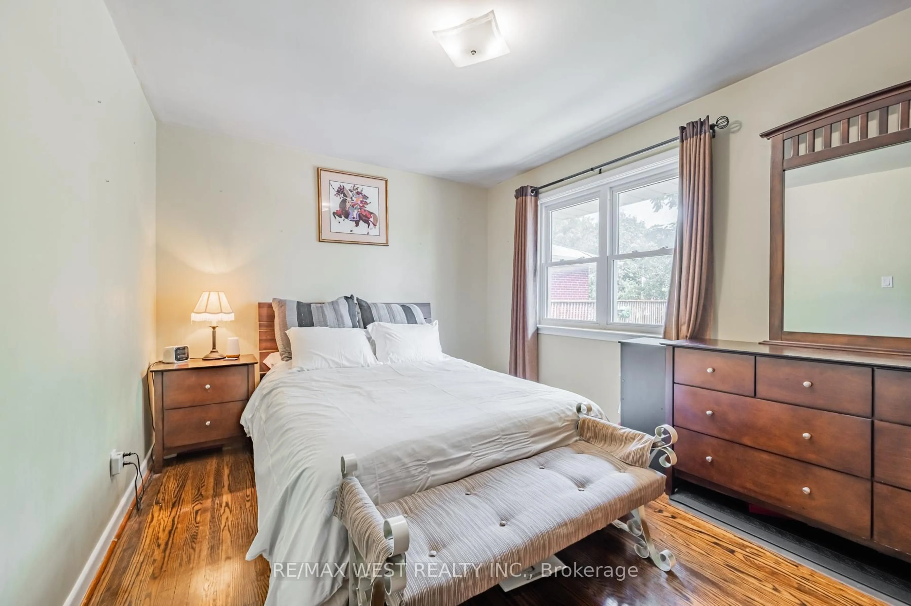 Bedroom with bed, wood/laminate floor for 54 Medley Cres, Toronto Ontario M1J 1Y3
