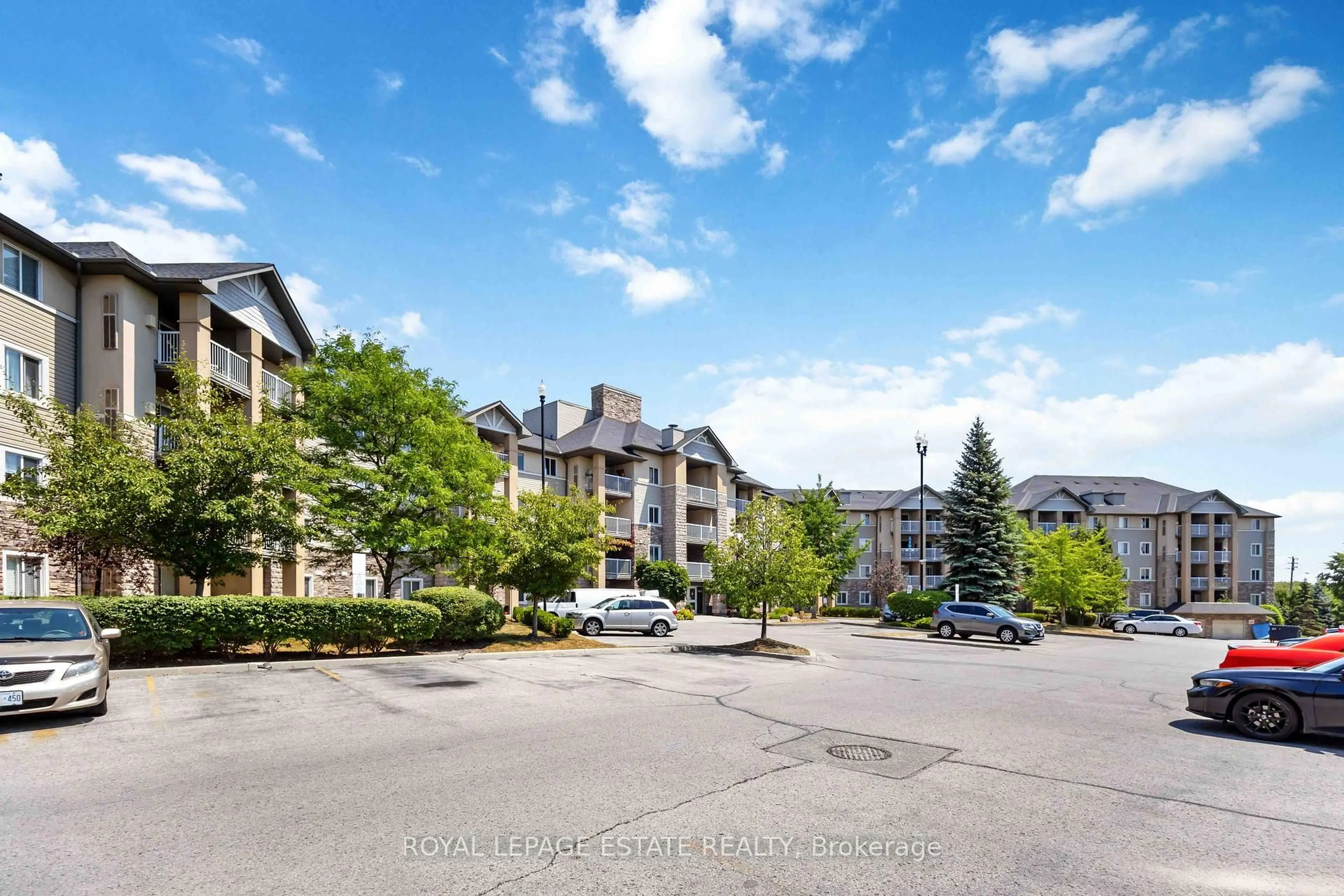 A pic from outside/outdoor area/front of a property/back of a property/a pic from drone, mountain view for 684 Warden Ave #325, Toronto Ontario M1L 4W4
