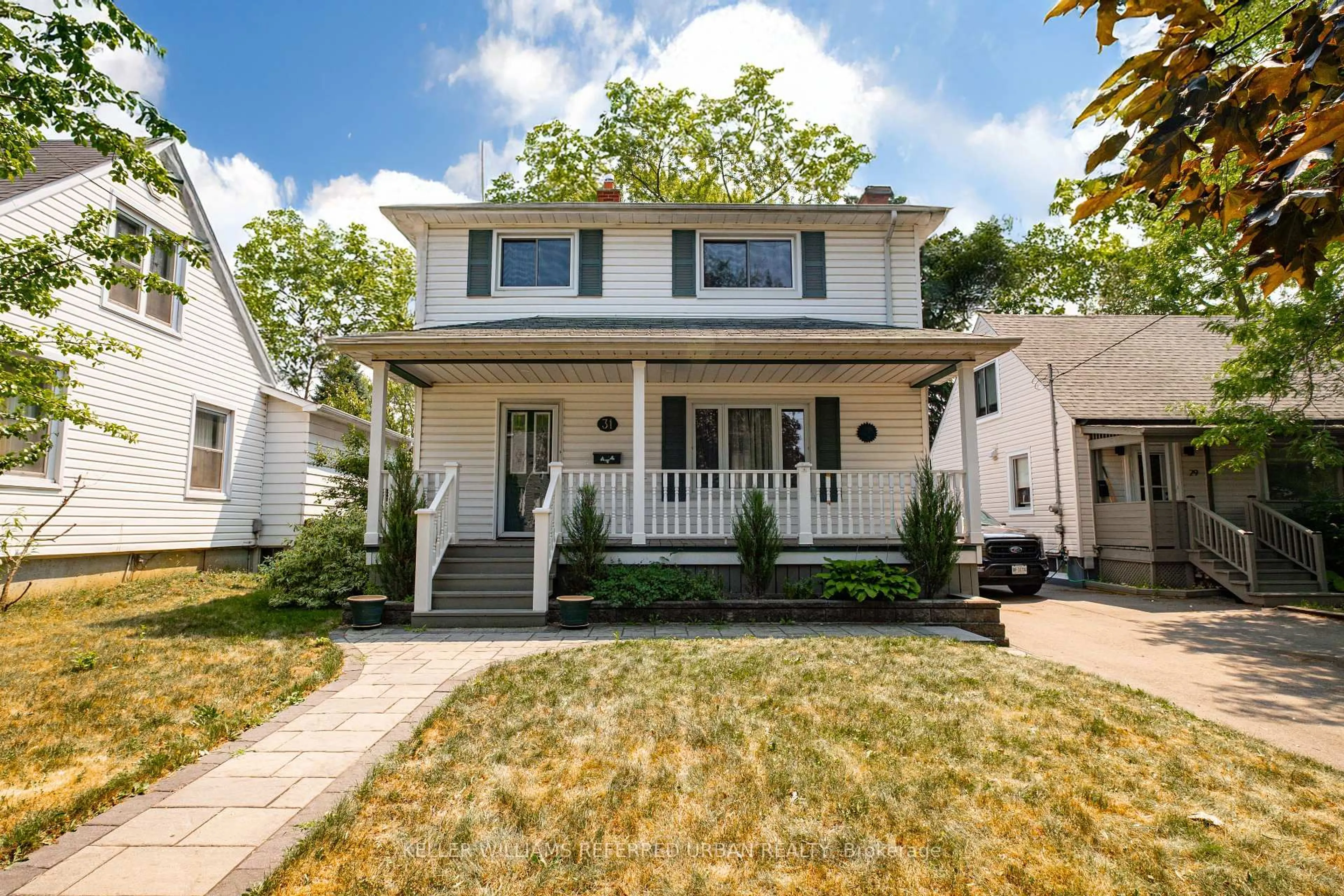 Home with vinyl exterior material, street for 31 Furnival Rd, Toronto Ontario M4B 1W4