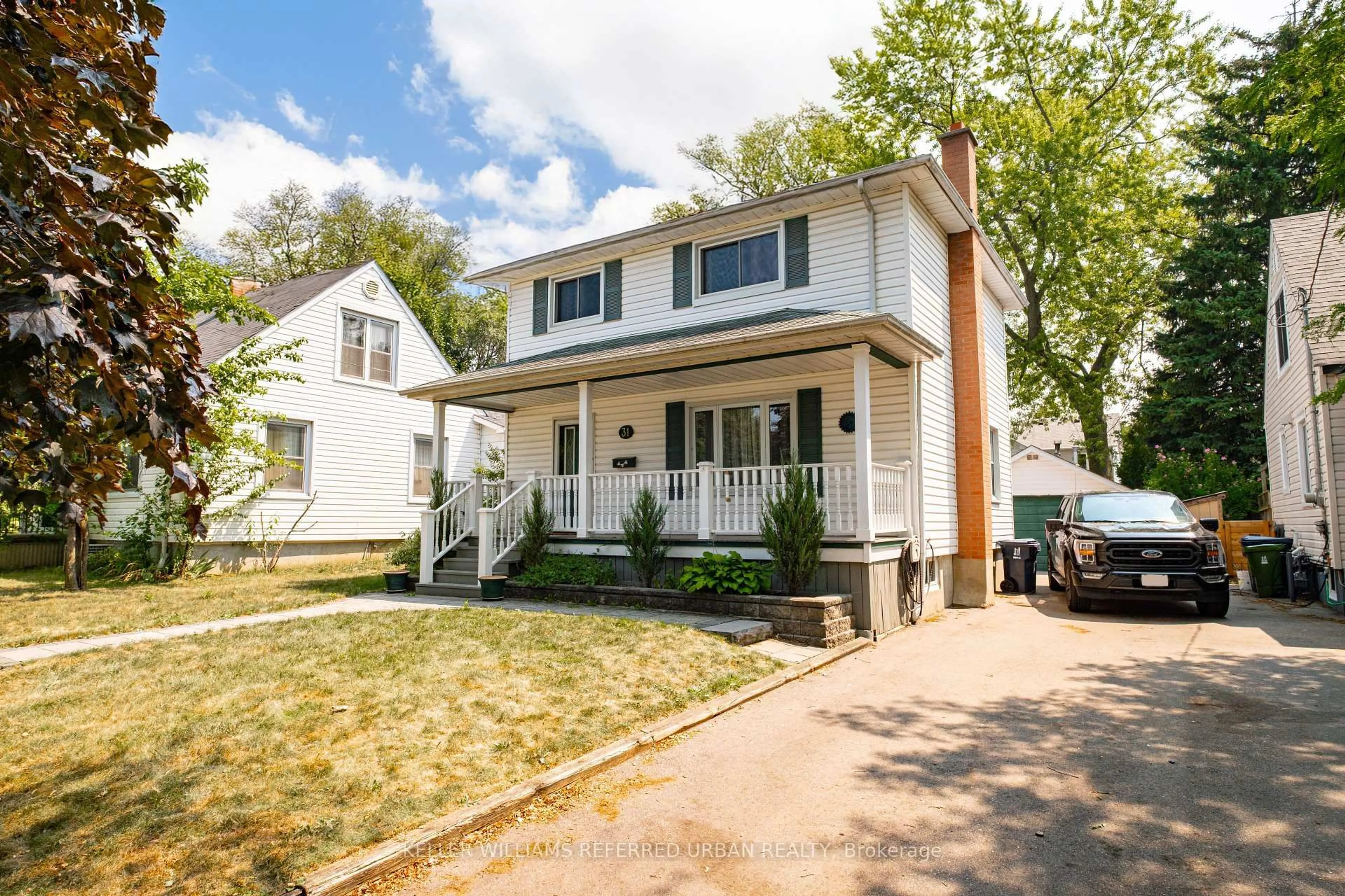 Home with vinyl exterior material, street for 31 Furnival Rd, Toronto Ontario M4B 1W4