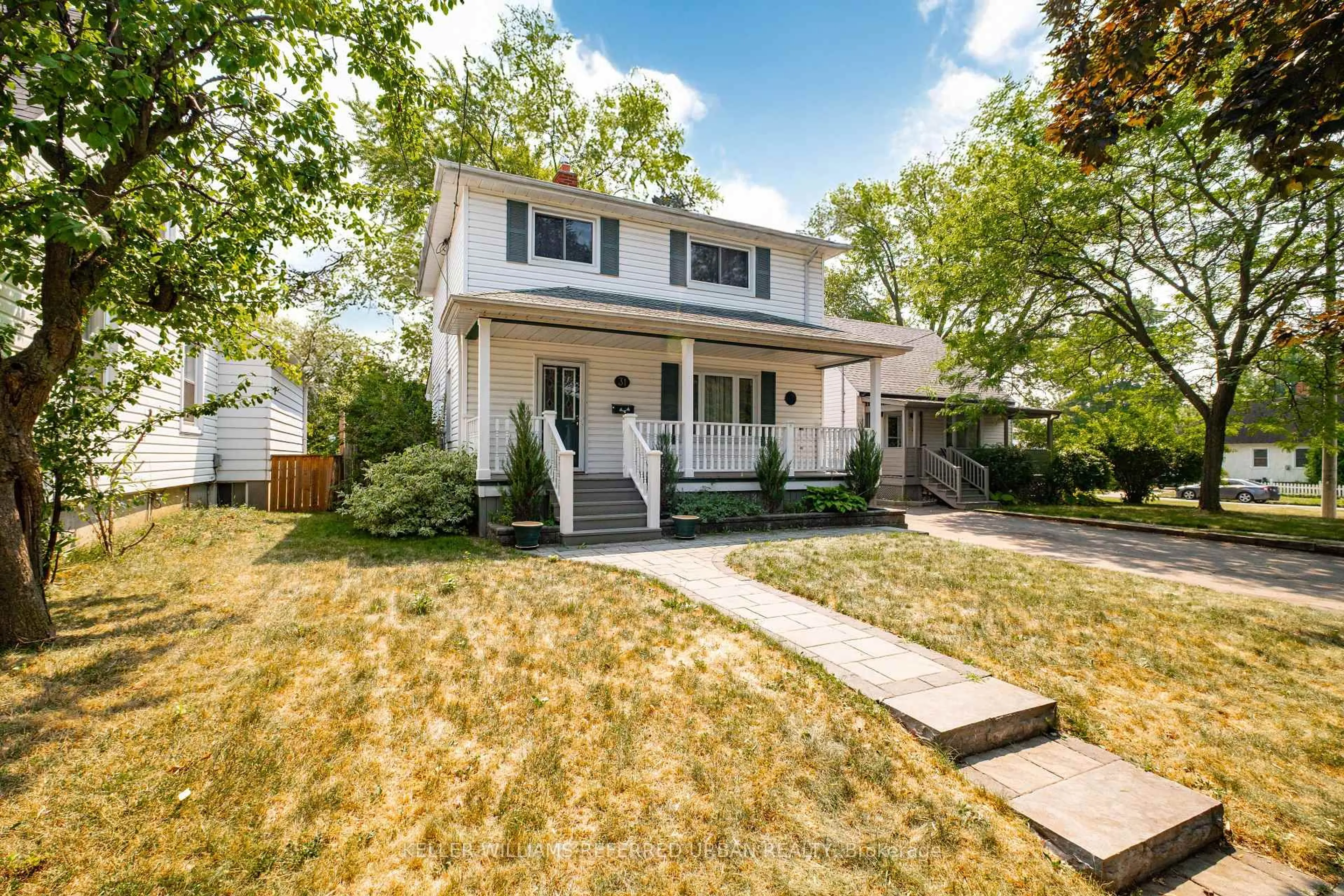 Home with vinyl exterior material, street for 31 Furnival Rd, Toronto Ontario M4B 1W4