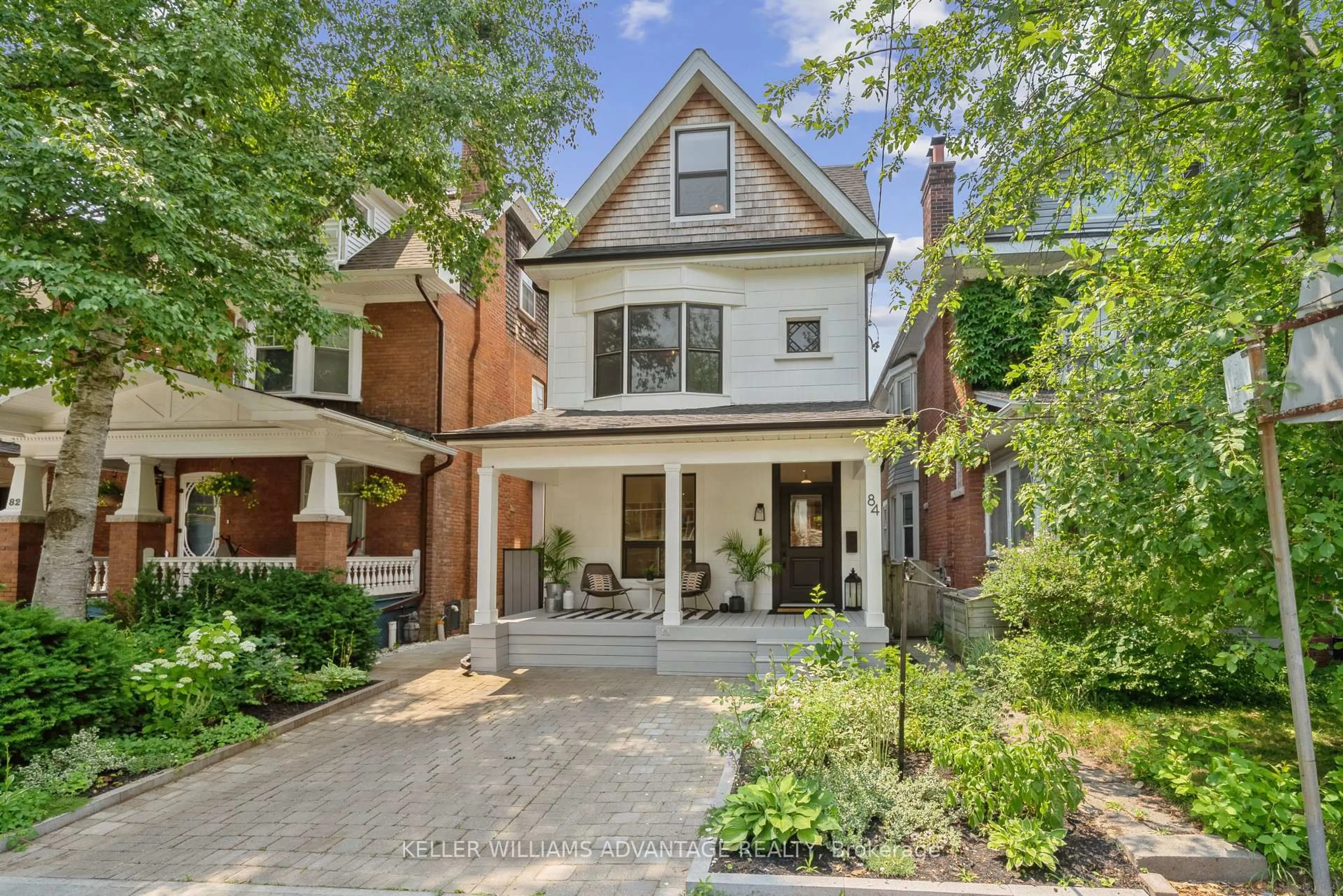 Home with brick exterior material, street for 84 Wheeler Ave, Toronto Ontario M4L 3V2
