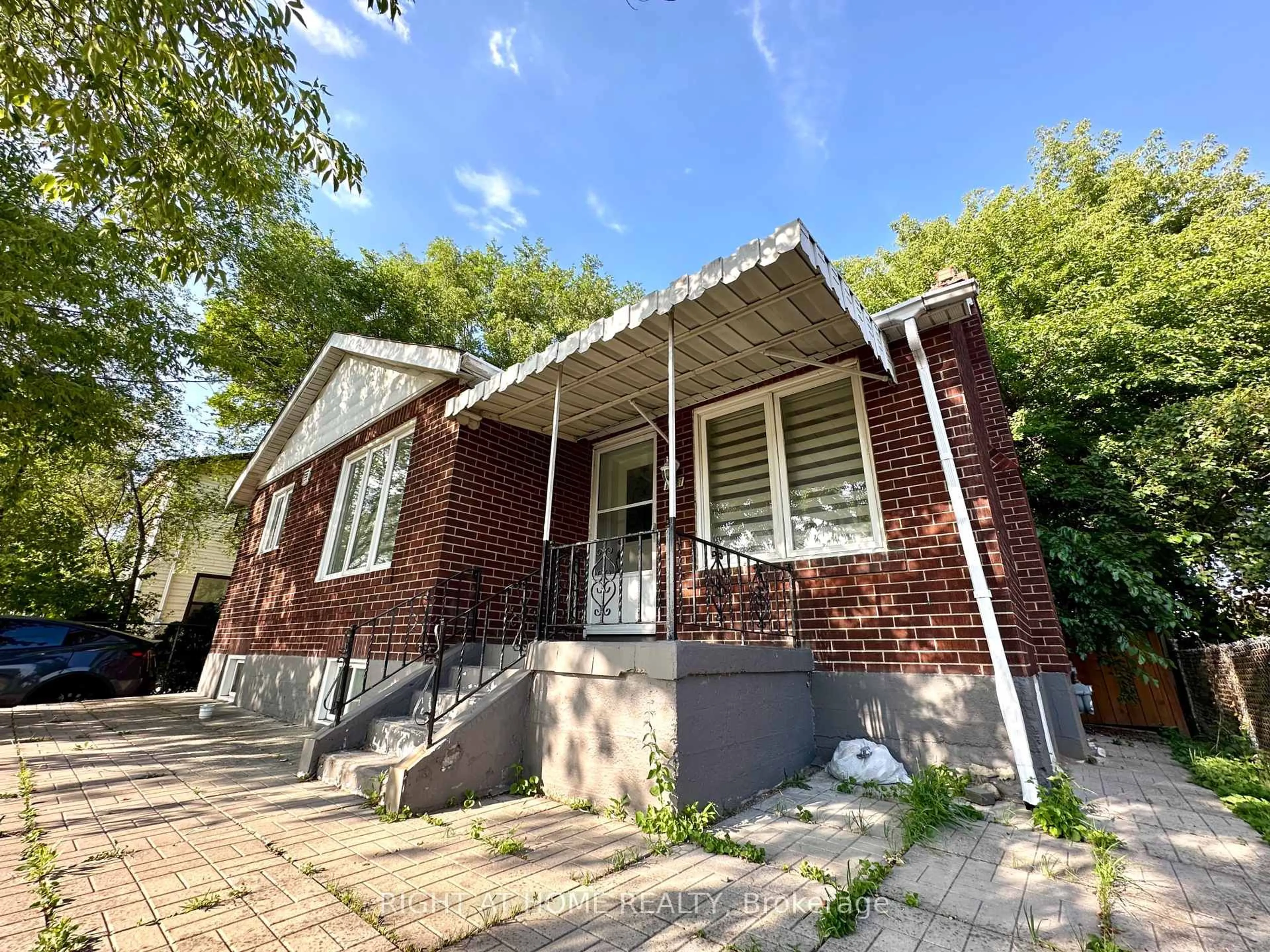 Home with brick exterior material, street for 1081 Victoria Park Ave, Toronto Ontario M4B 2K2