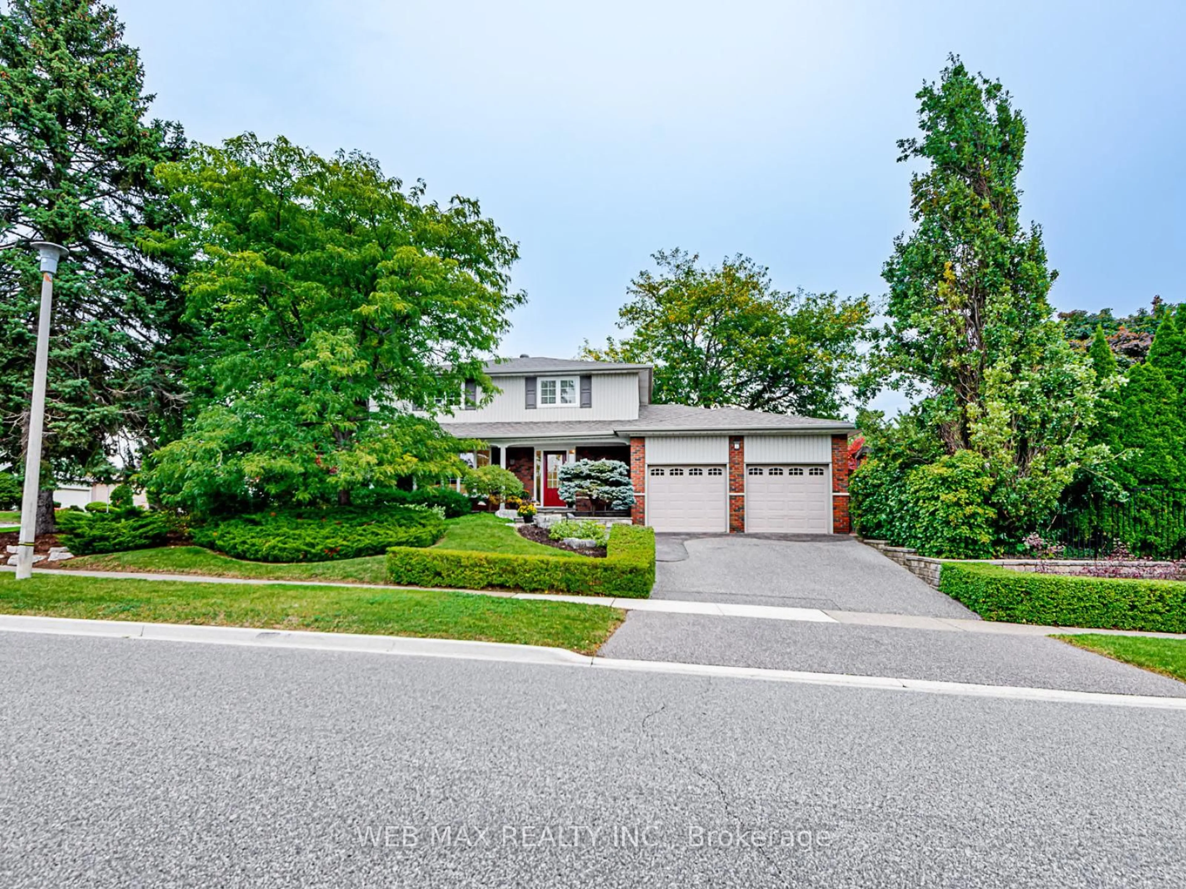 Home with brick exterior material, street for 2 Creekwood Dr, Toronto Ontario M1E 4L7