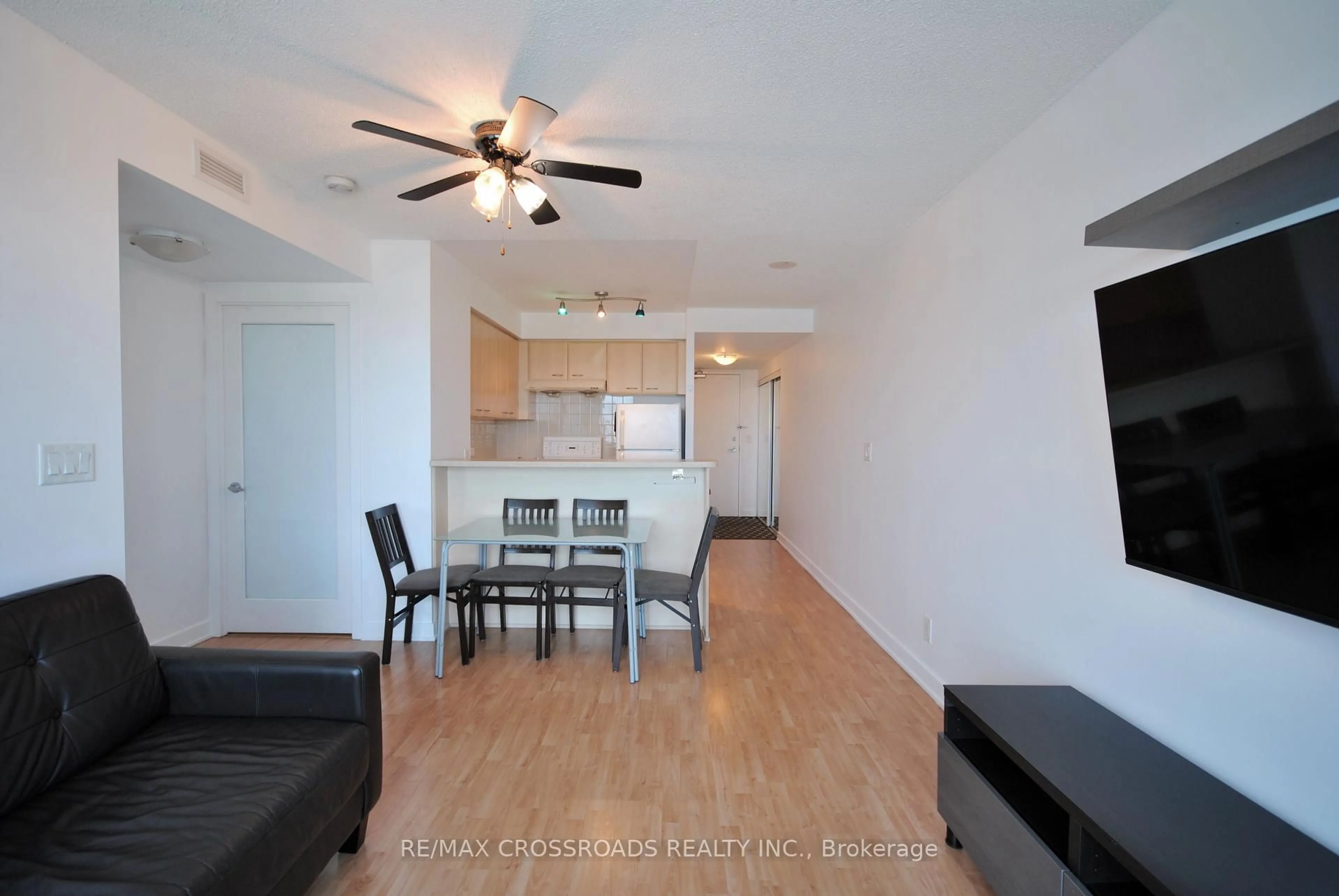 Living room with furniture, wood/laminate floor for 38 Lee Centre Dr #2115, Toronto Ontario M1H 3J7