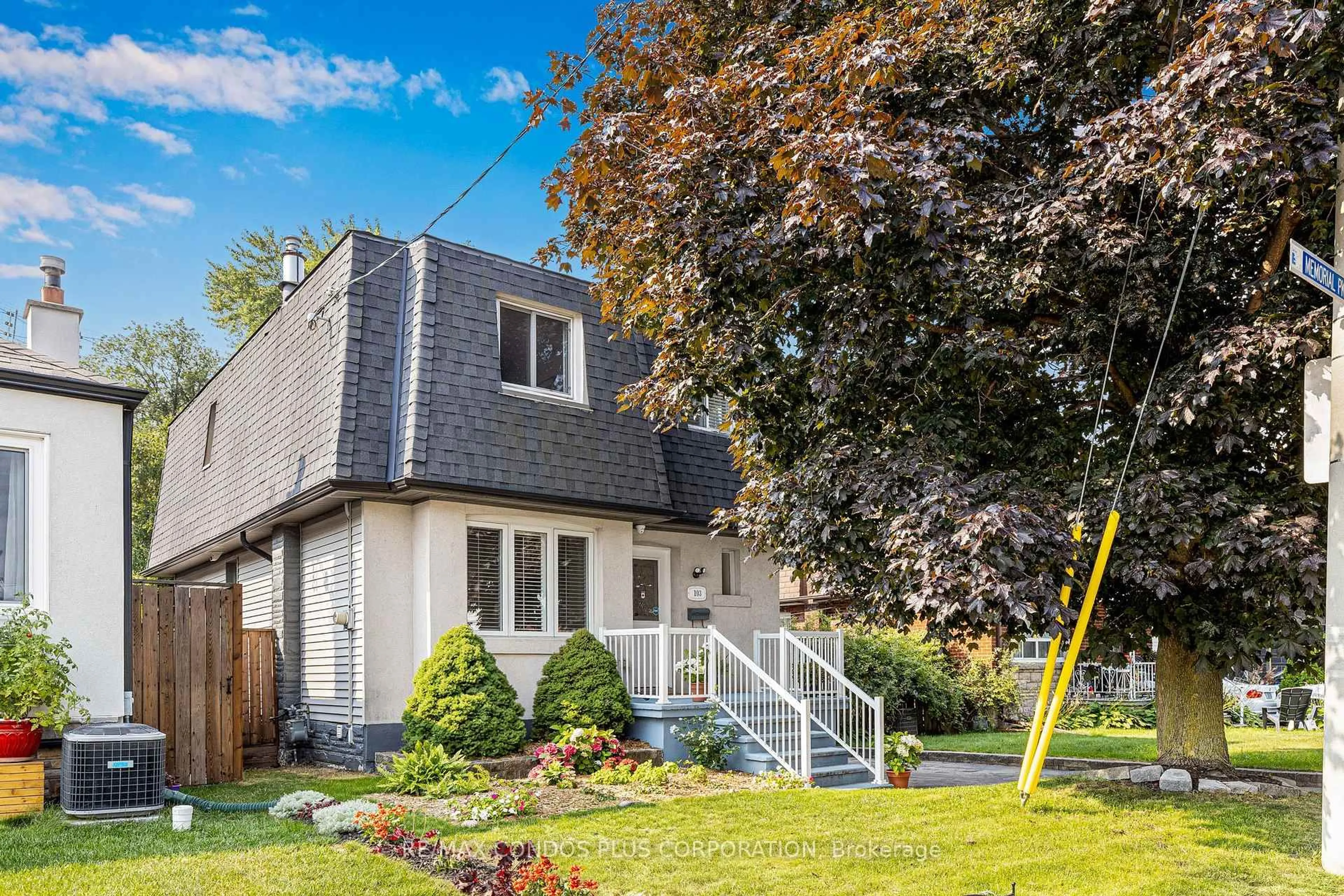 Home with vinyl exterior material, street for 103 Memorial Park Ave, Toronto Ontario M4J 2K1