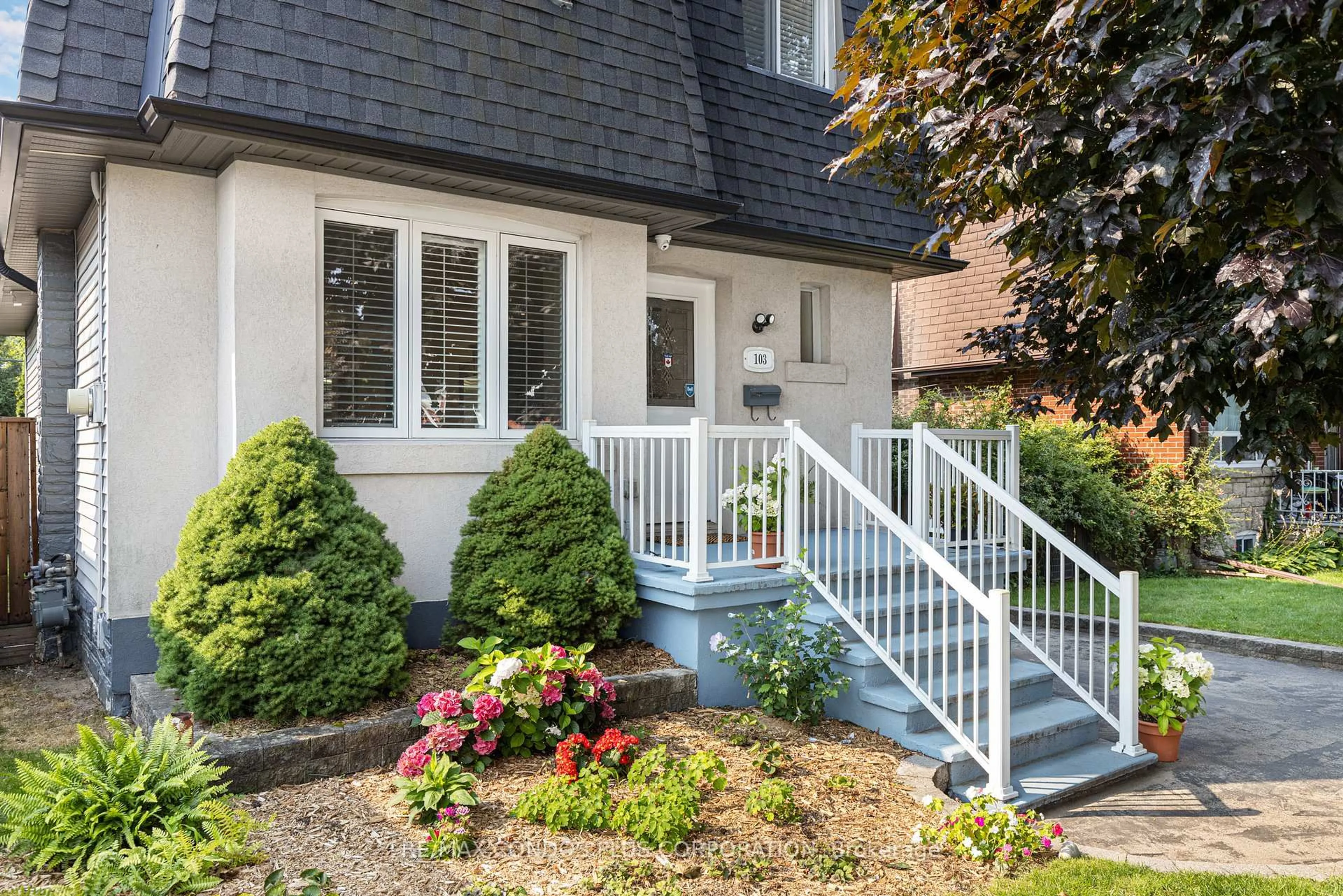 Home with vinyl exterior material, street for 103 Memorial Park Ave, Toronto Ontario M4J 2K1