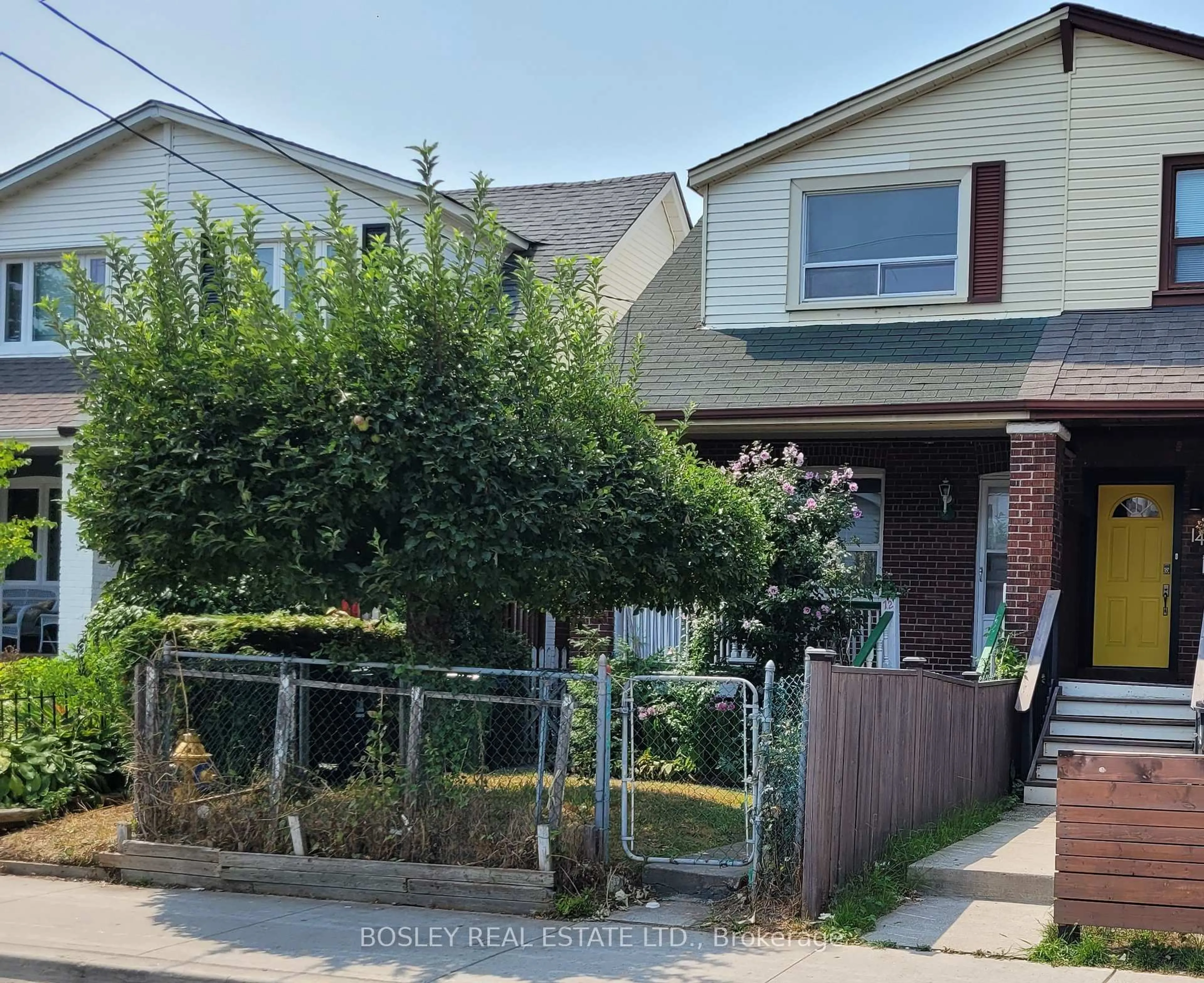Home with brick exterior material, street for 12 Thyra Ave, Toronto Ontario M4C 5G5