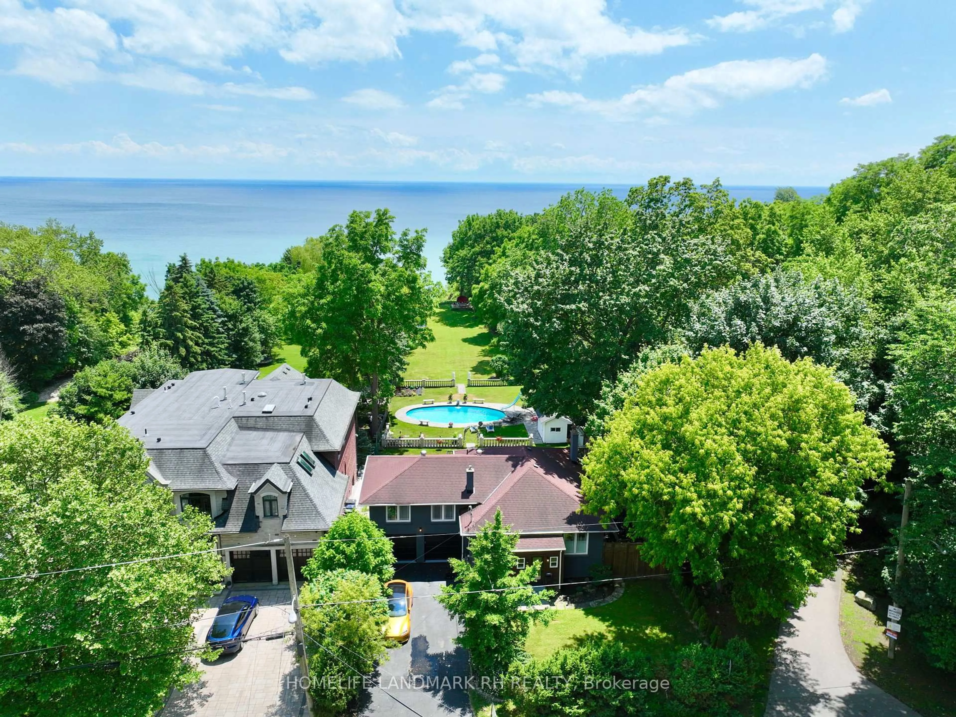 A pic from outside/outdoor area/front of a property/back of a property/a pic from drone, water/lake/river/ocean view for 61 Sylvan Ave, Toronto Ontario M1M 1J9