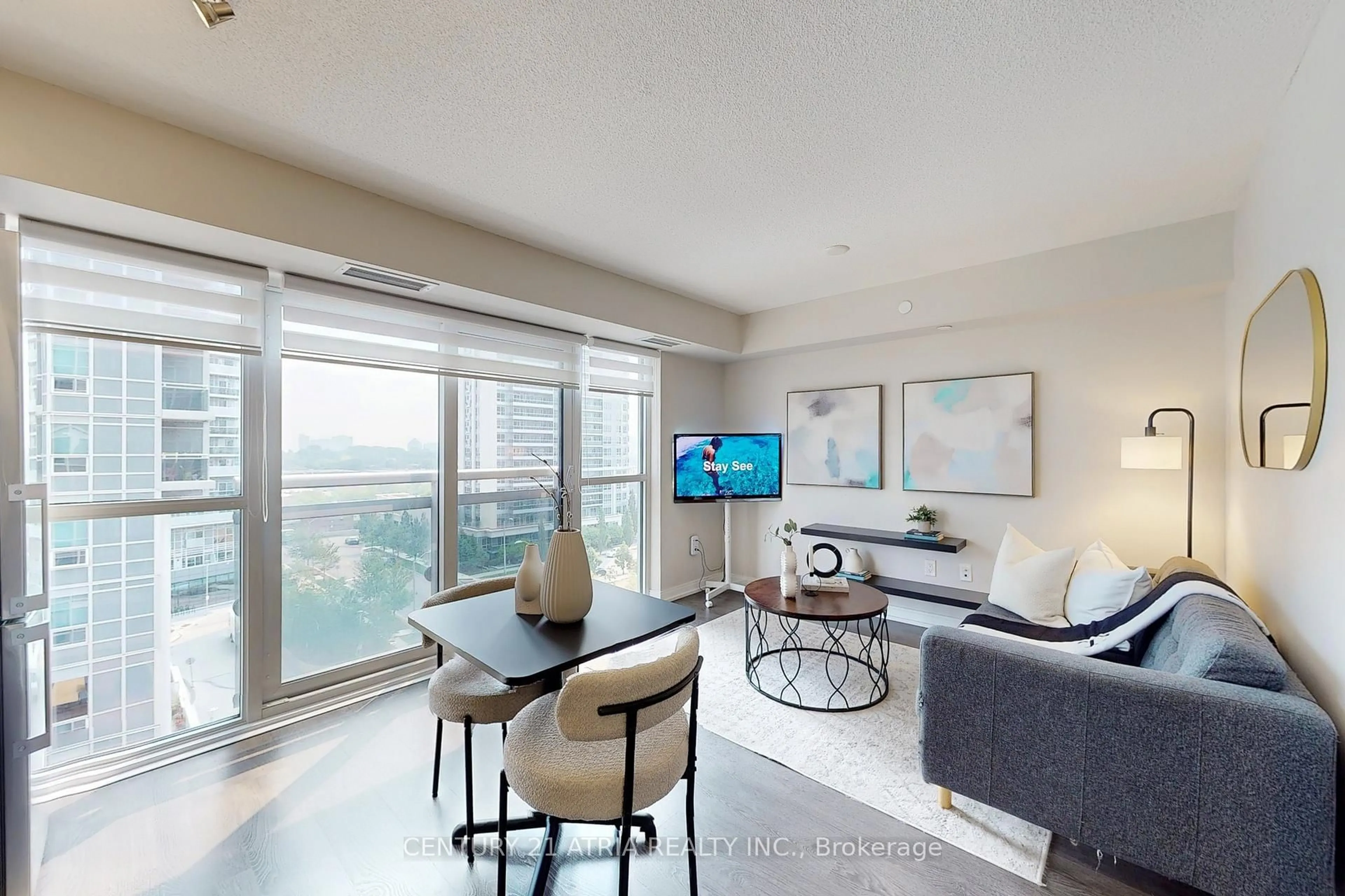 Living room with furniture, unknown for 275 Village Green Sq #717, Toronto Ontario M1S 0L8
