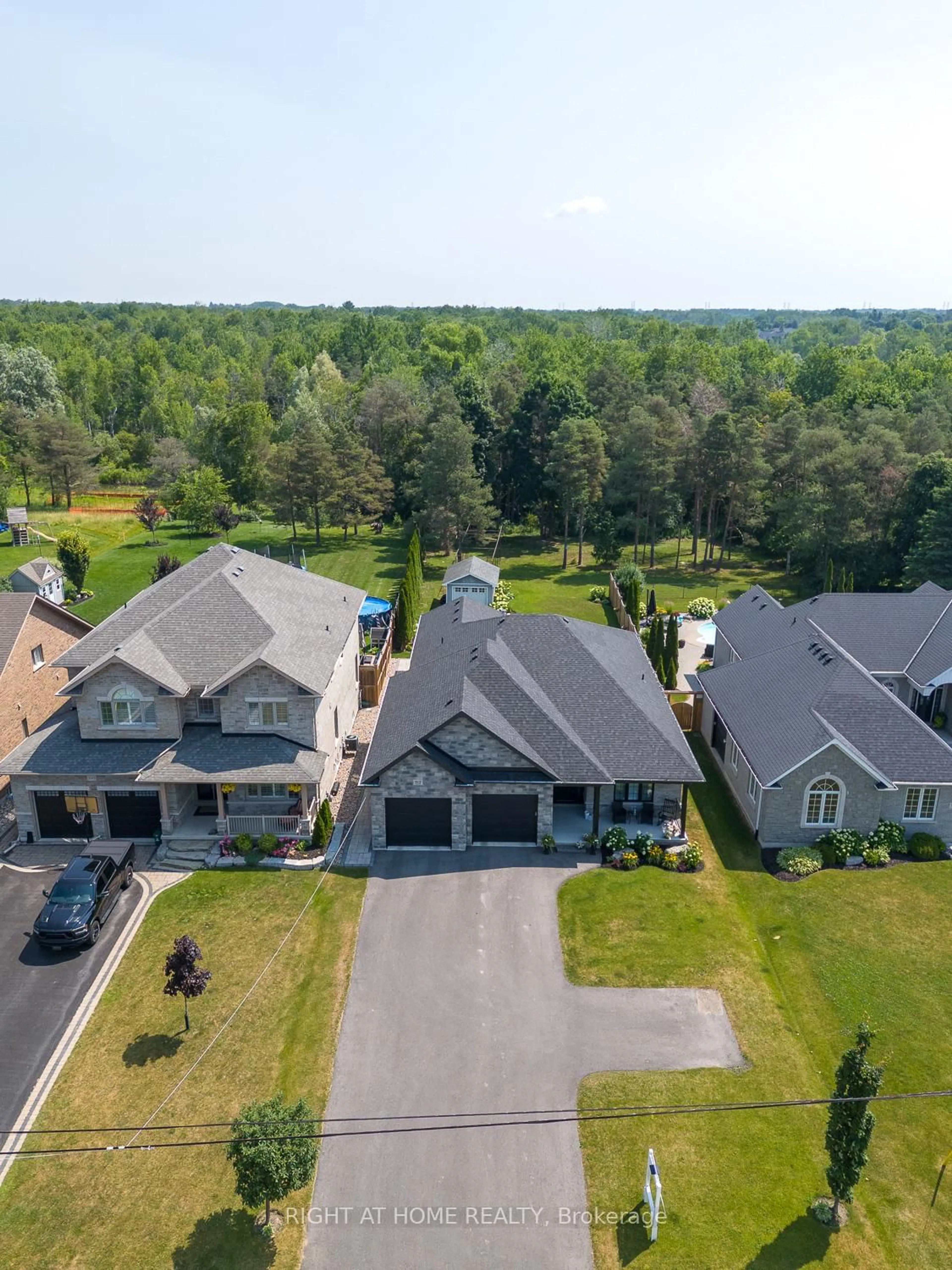 A pic from outside/outdoor area/front of a property/back of a property/a pic from drone, water/lake/river/ocean view for 3307 Trulls Rd, Clarington Ontario L1E 2L2