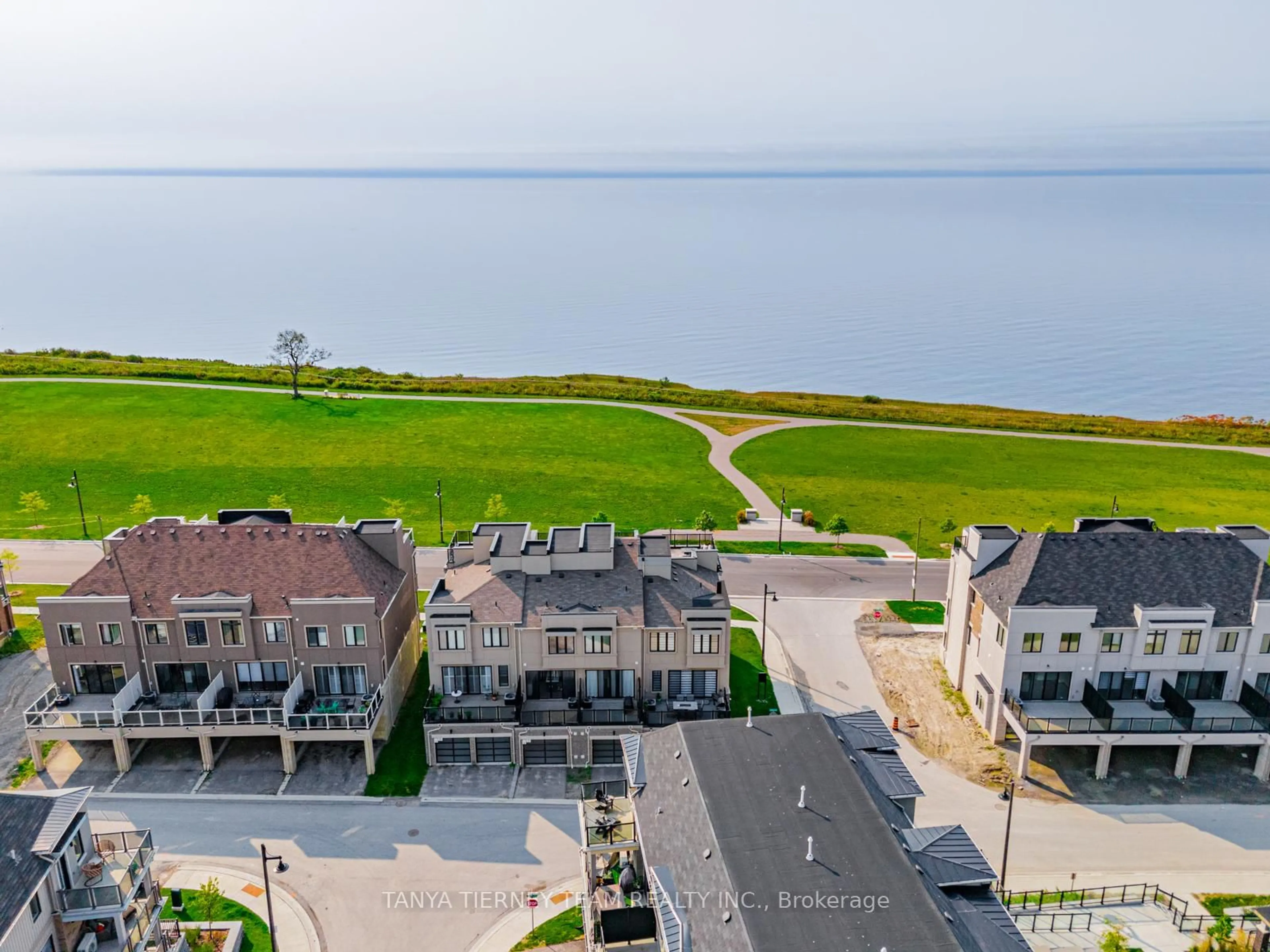 A pic from outside/outdoor area/front of a property/back of a property/a pic from drone, water/lake/river/ocean view for 605 Port Darlington Rd, Clarington Ontario L1C 7G1