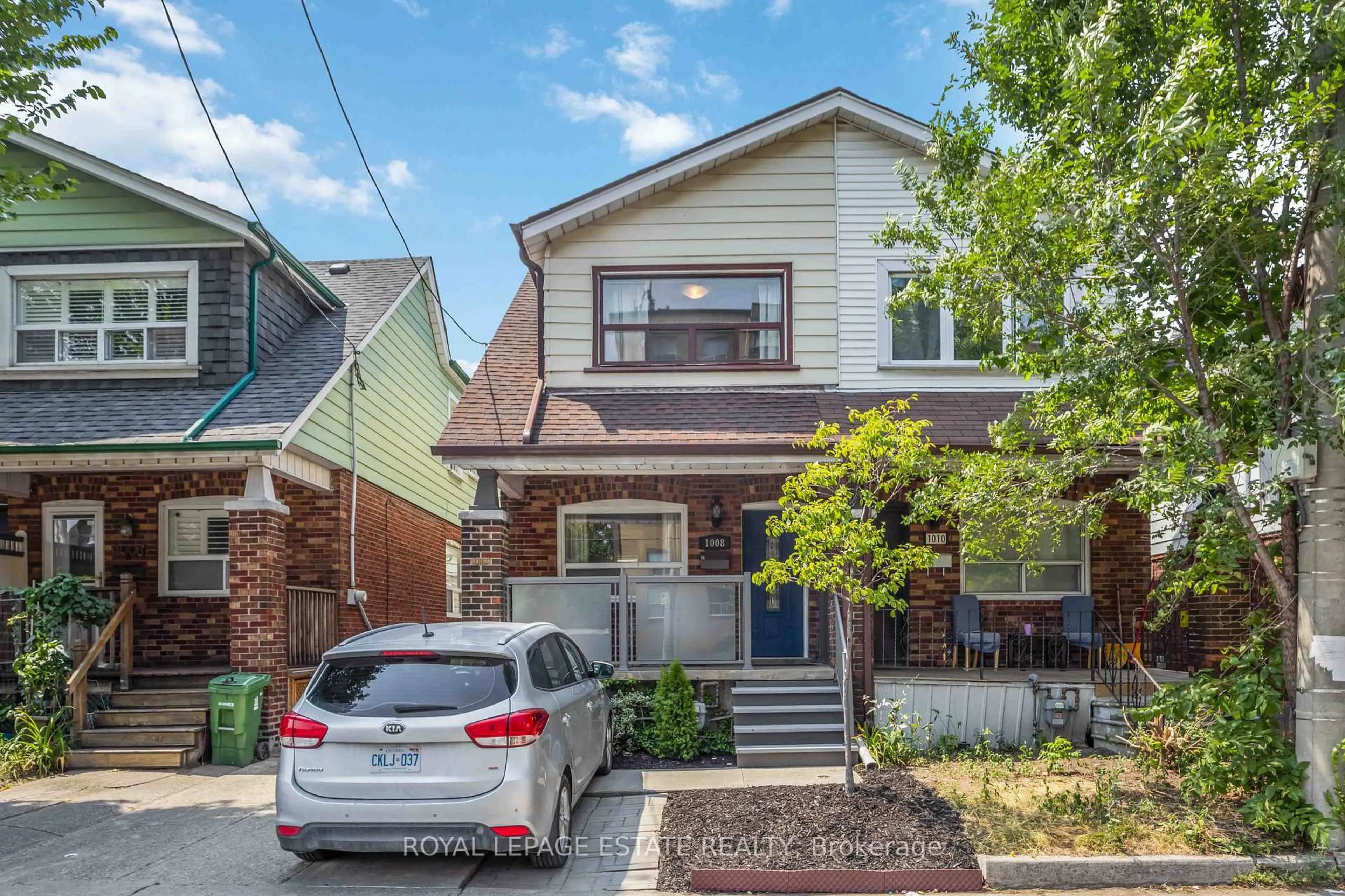 Home with brick exterior material, street for 1008 Woodbine Ave, Toronto Ontario M4C 4C1