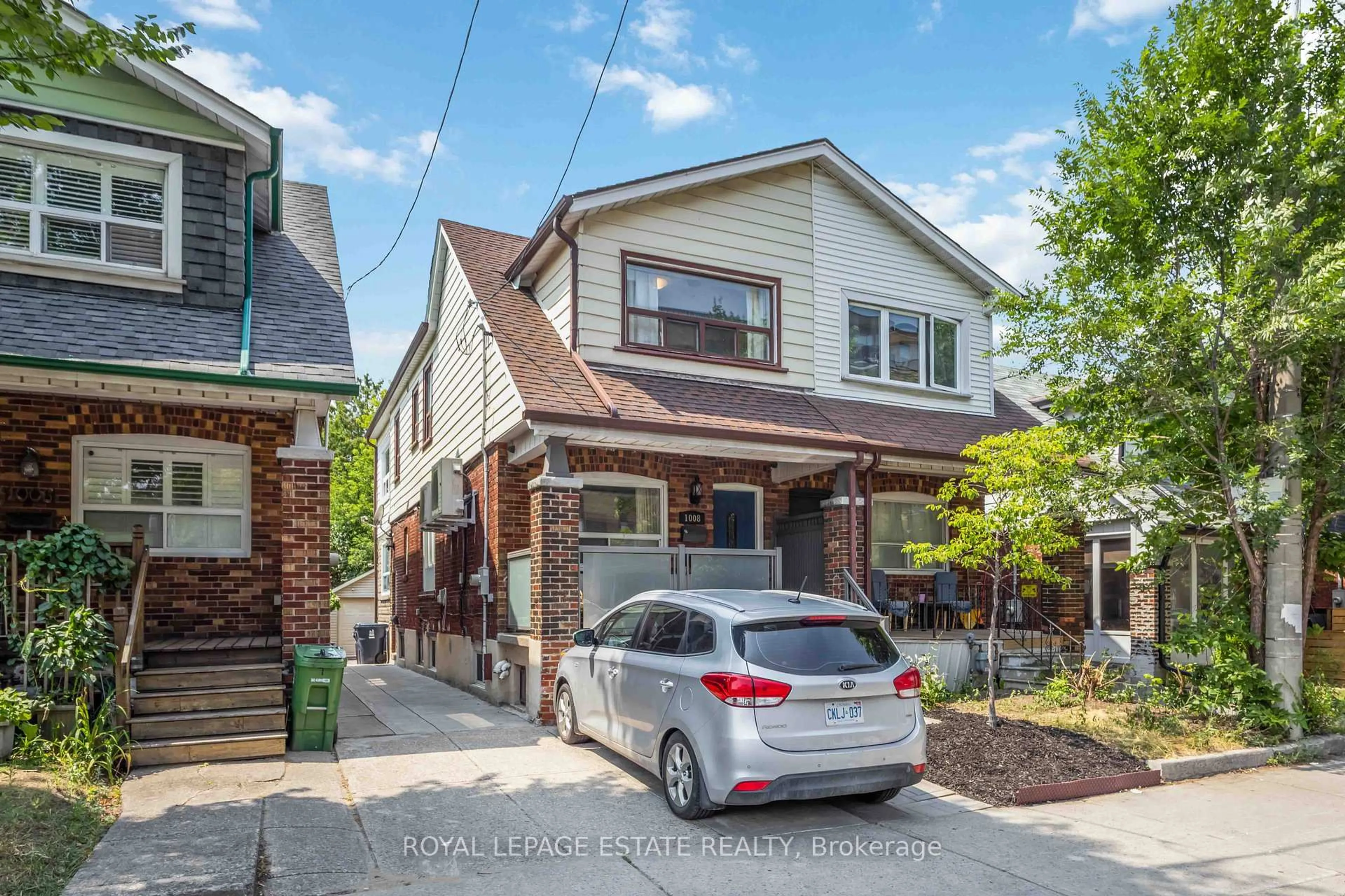 Home with brick exterior material, street for 1008 Woodbine Ave, Toronto Ontario M4C 4C1