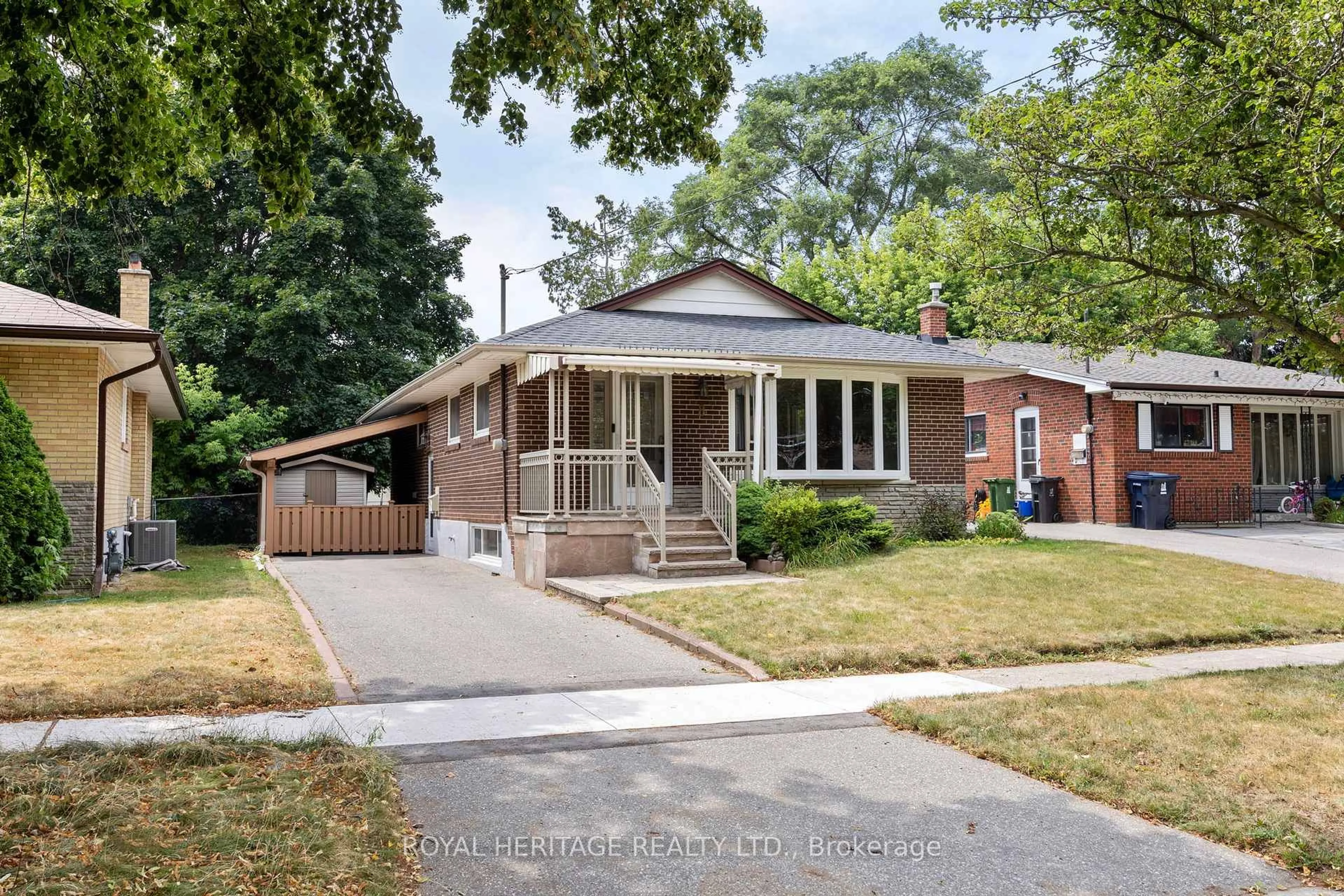 Home with brick exterior material, street for 8 Abbeville Rd, Toronto Ontario M1H 1Y3