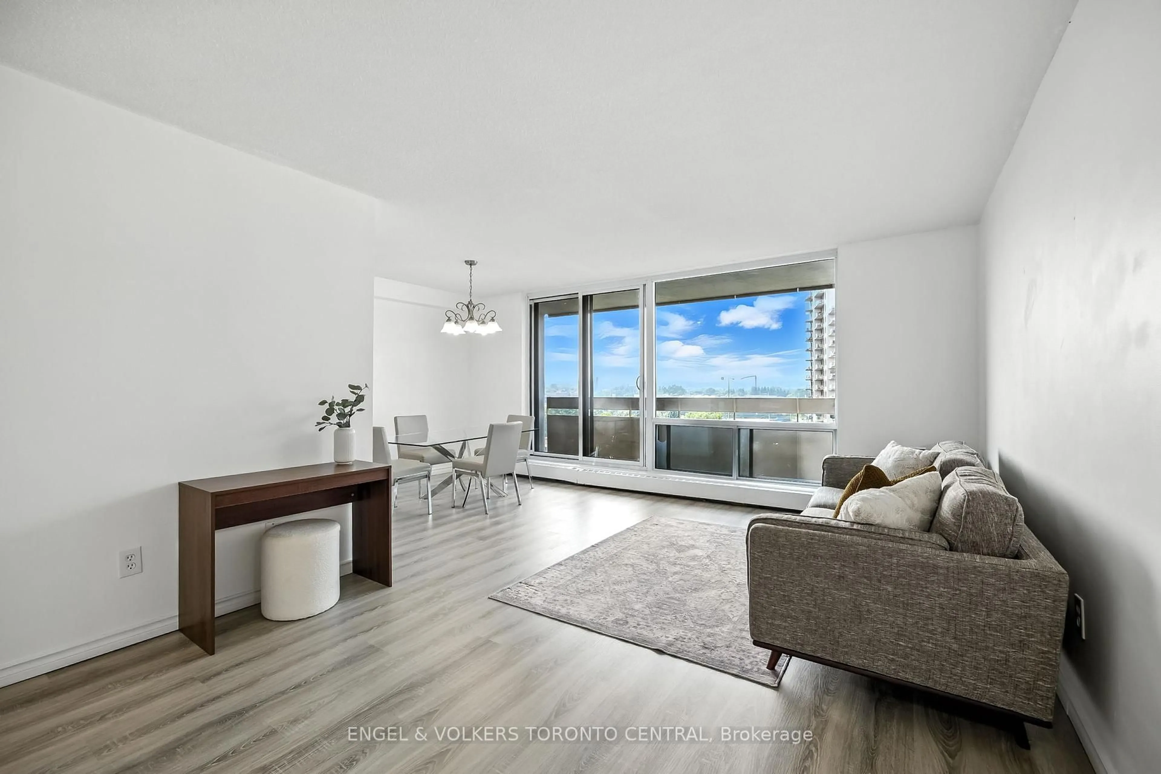 Living room with furniture, wood/laminate floor for 1210 Radom St #910, Pickering Ontario L1W 2Z3