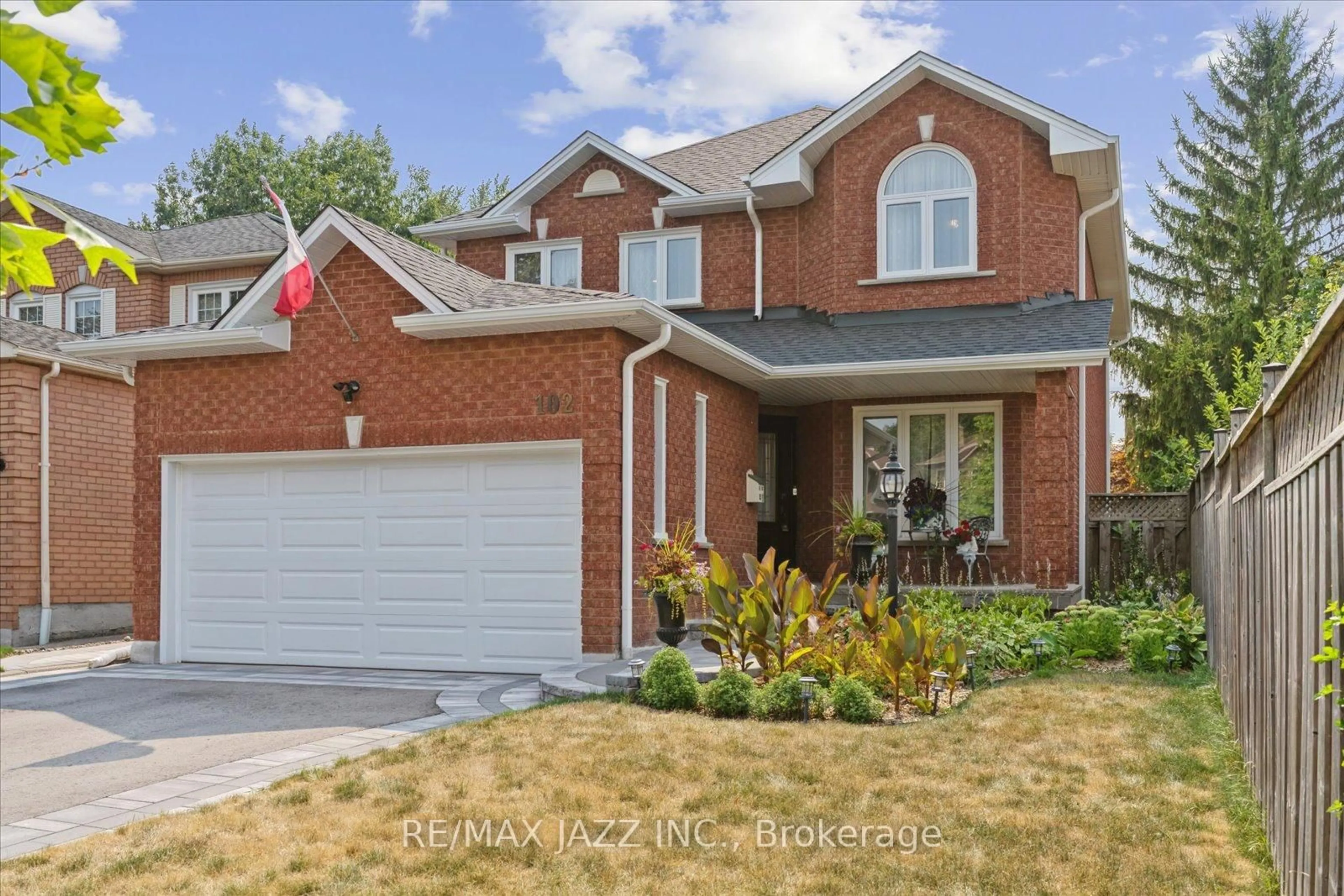 Home with brick exterior material, street for 102 Harkness Dr, Whitby Ontario L1R 2G1