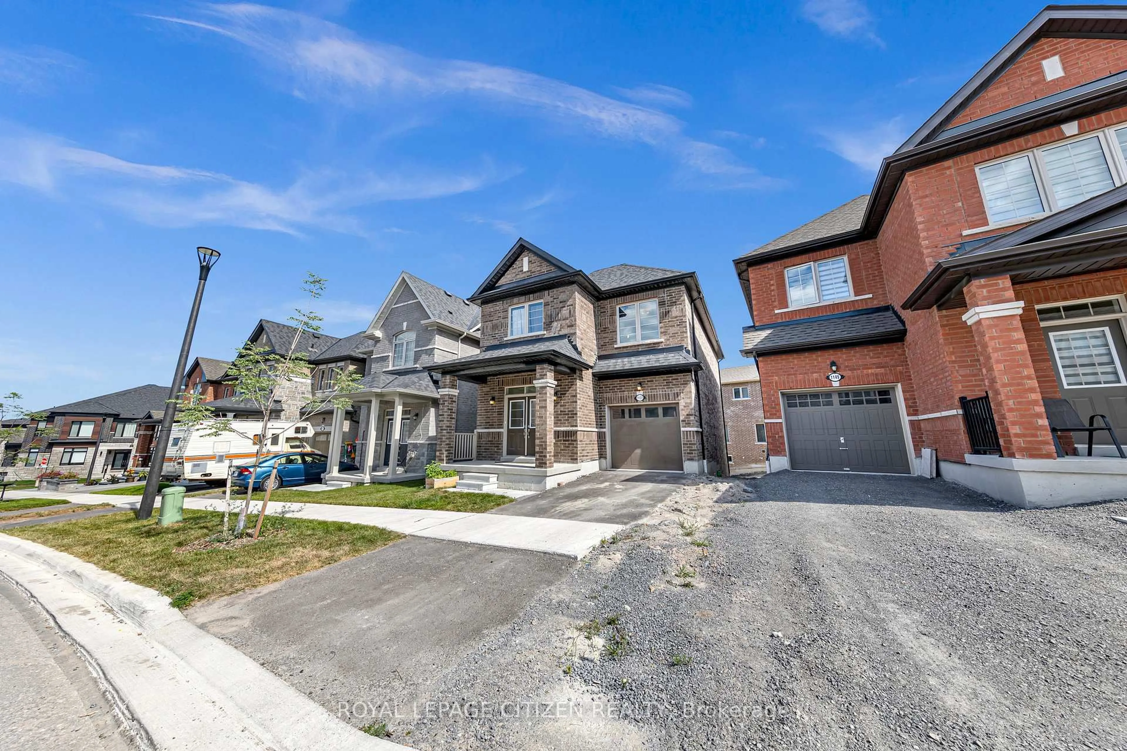 Home with brick exterior material, street for 1151 Skyridge Blvd, Pickering Ontario L1X 0M4