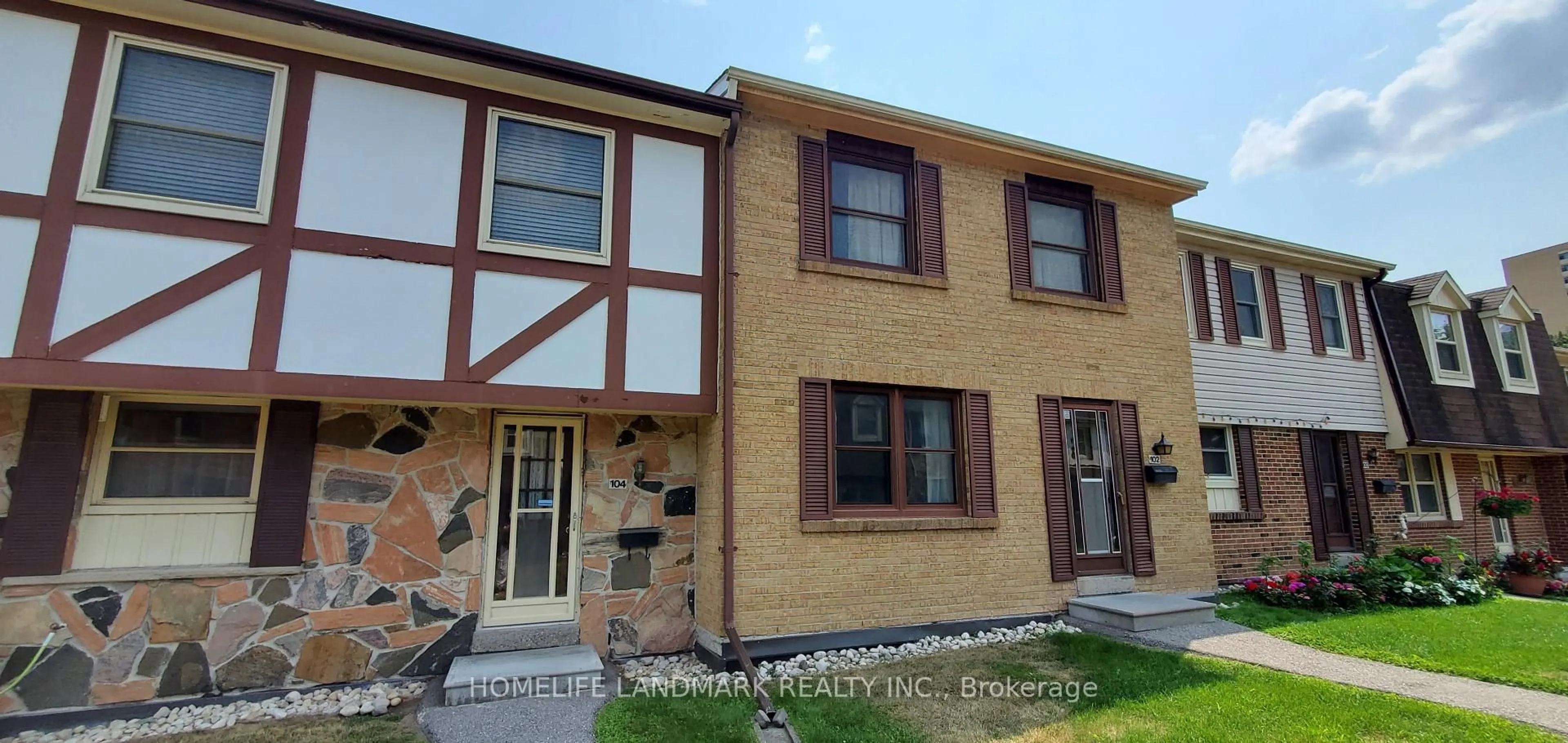 Home with brick exterior material, street for 91 L'Amoreaux Dr #102, Toronto Ontario M1W 2J8