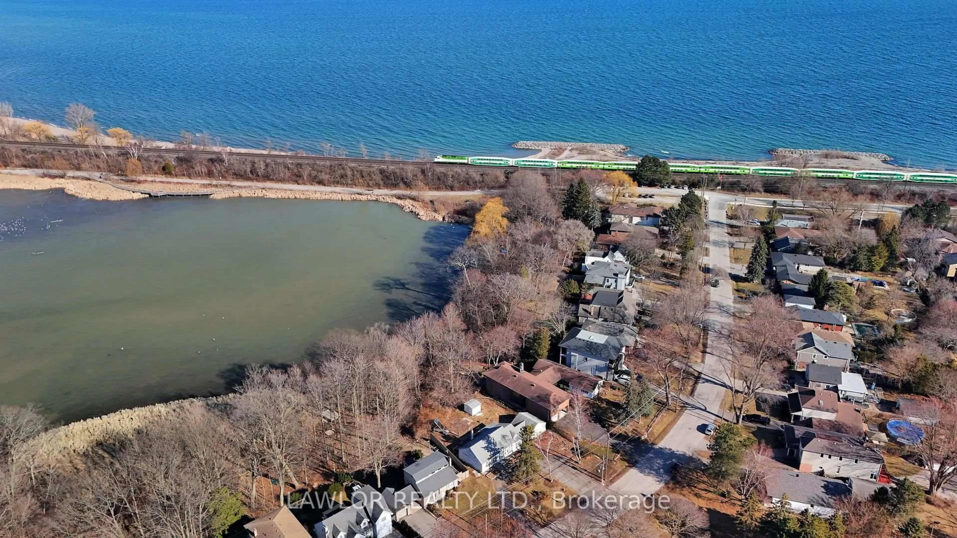 A pic from outside/outdoor area/front of a property/back of a property/a pic from drone, water/lake/river/ocean view for 237 ROUGE HILLS Dr, Toronto Ontario M1C 2Y9