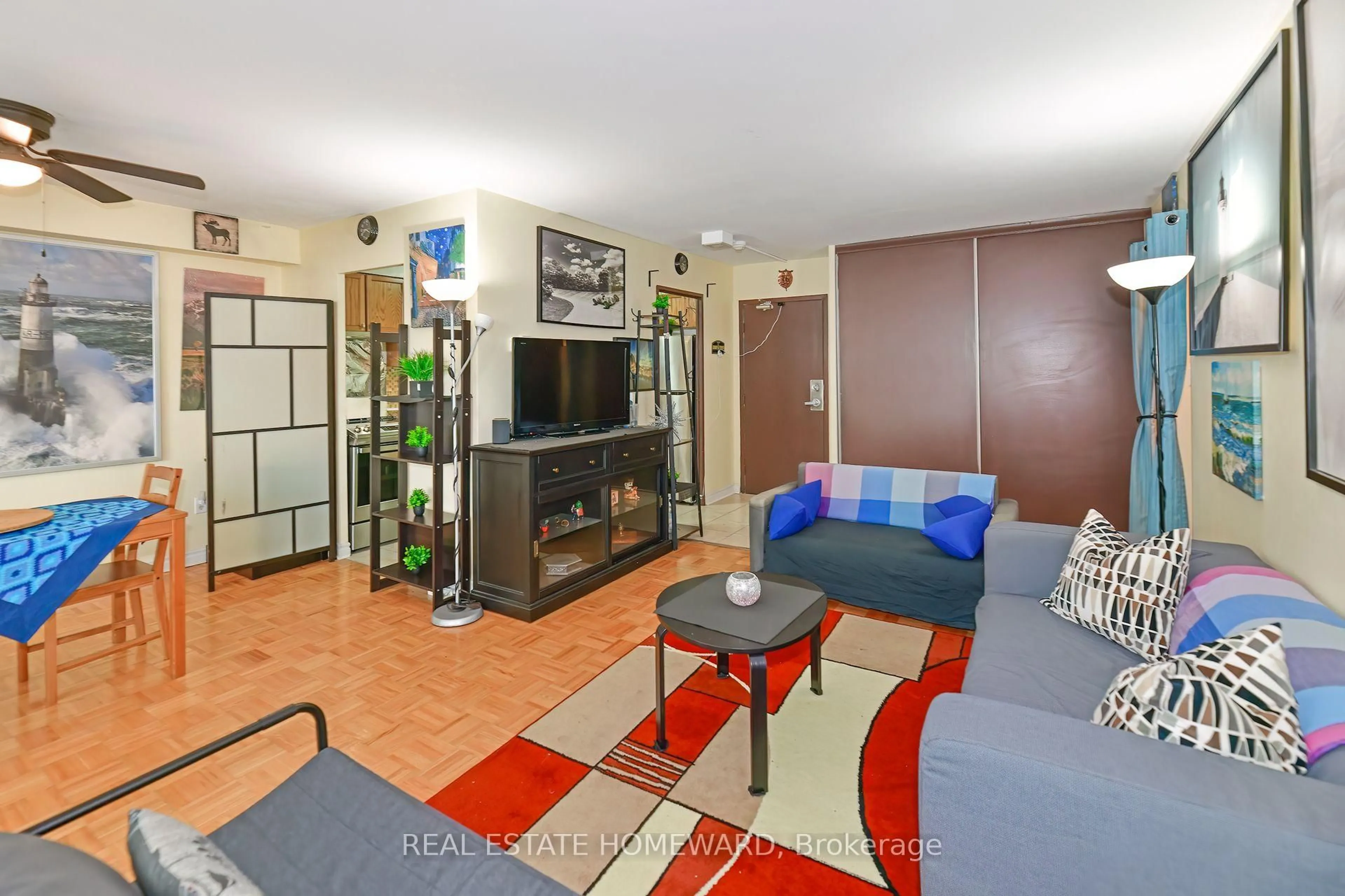 Living room with furniture, unknown for 5 Massey Sq #1503, Toronto Ontario M4C 5L6