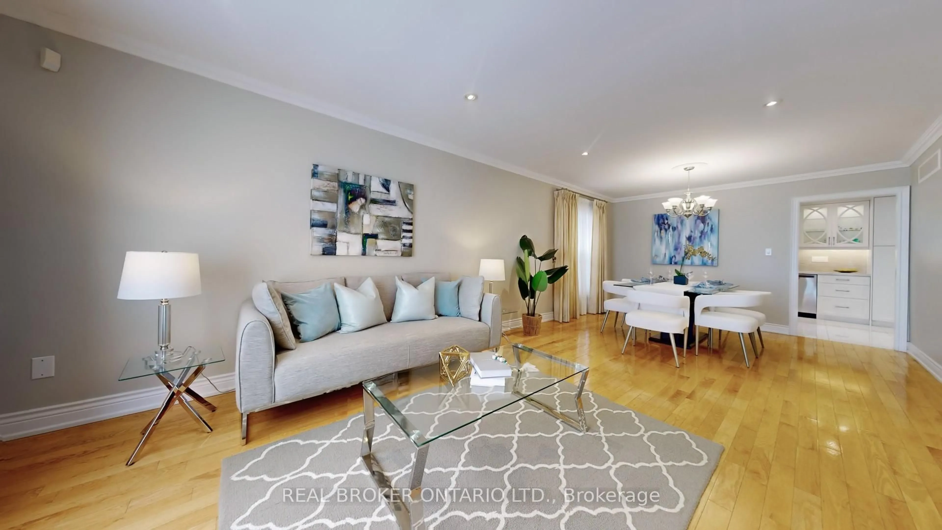 Living room with furniture, wood/laminate floor for 255 Port Royal Tr, Toronto Ontario M1V 2K2