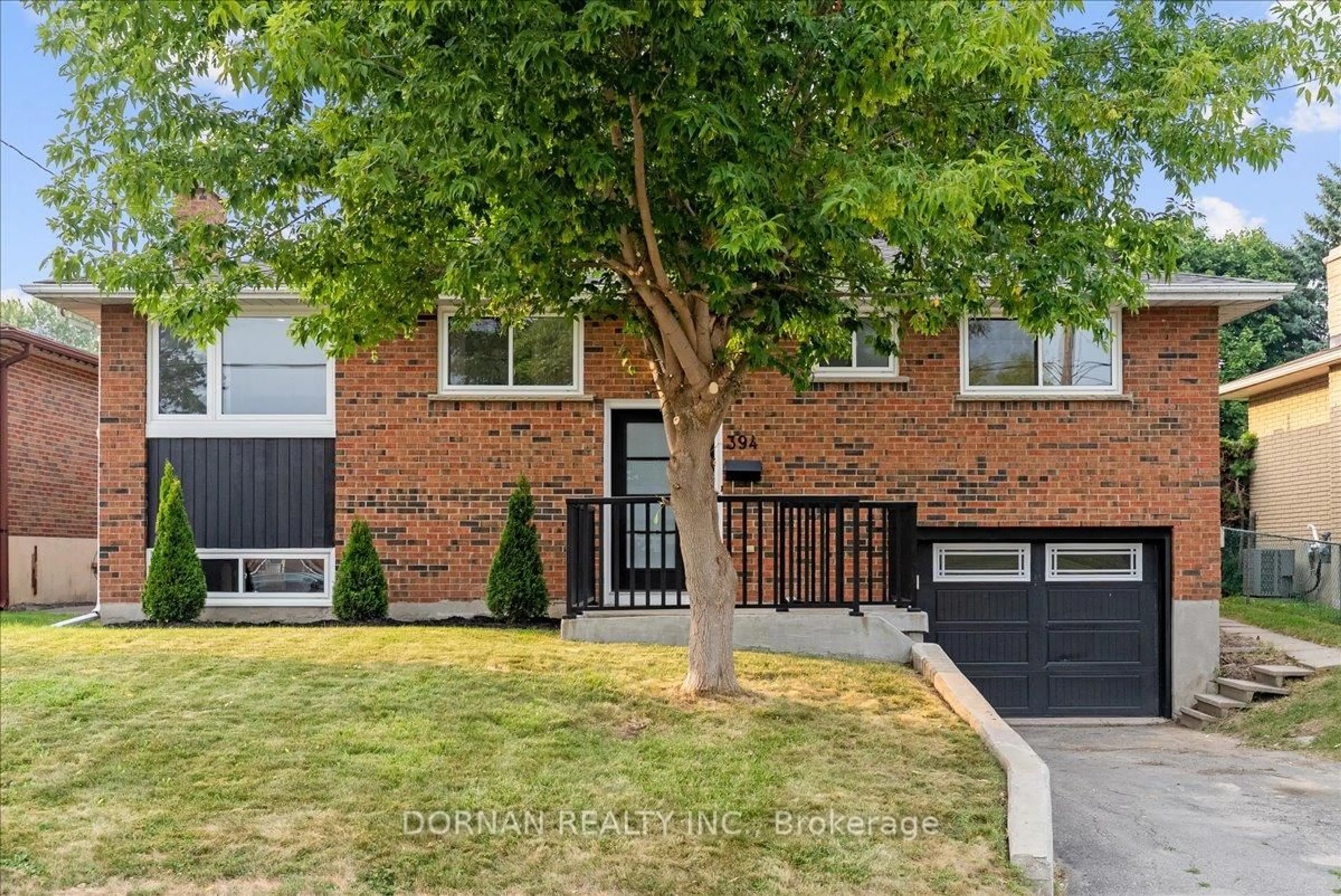 Home with brick exterior material, street for 394 Rossland Rd, Oshawa Ontario L1G 2X1