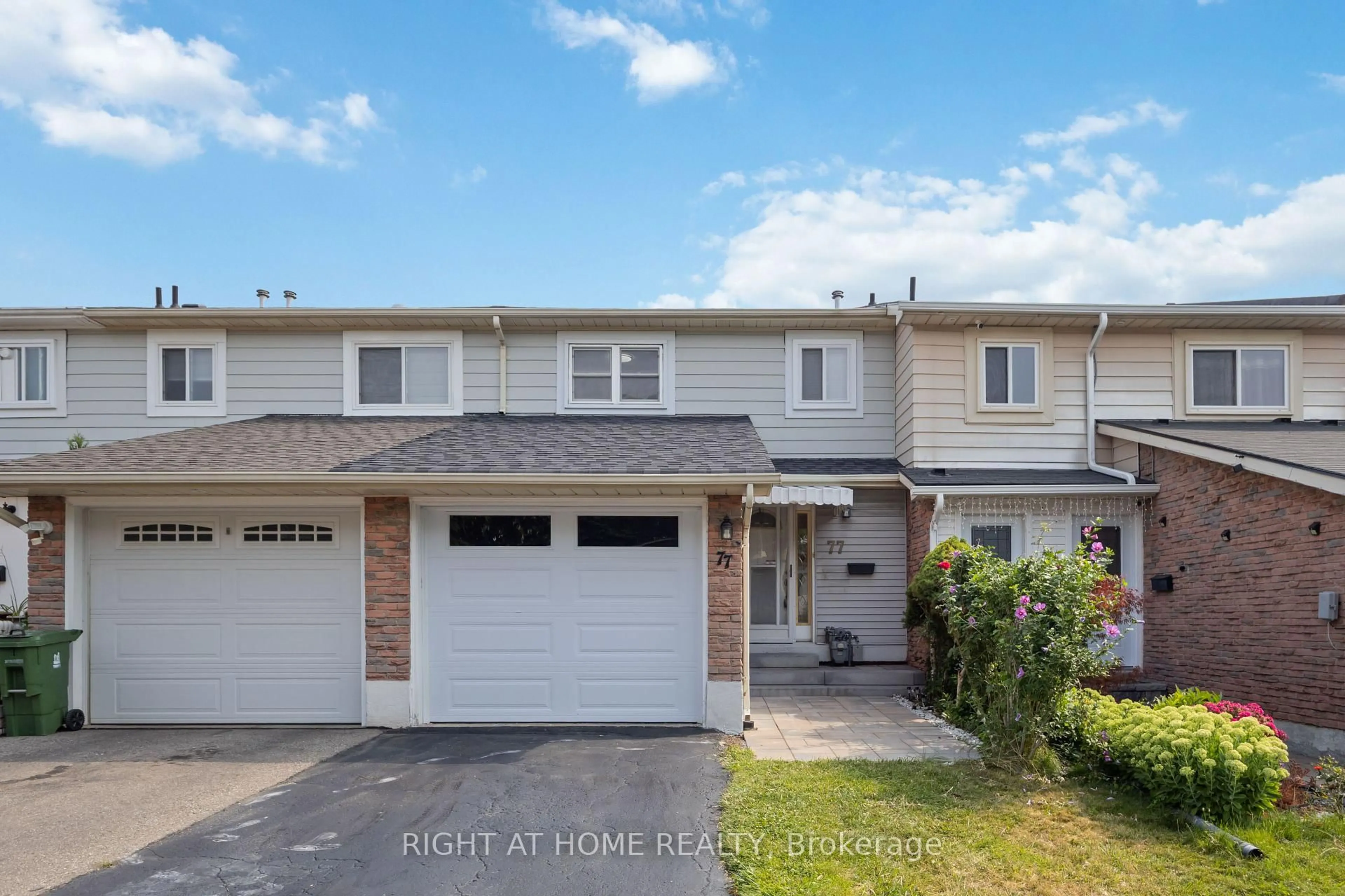 Home with vinyl exterior material, street for 77 Lowry Sq, Toronto Ontario M1B 1N7