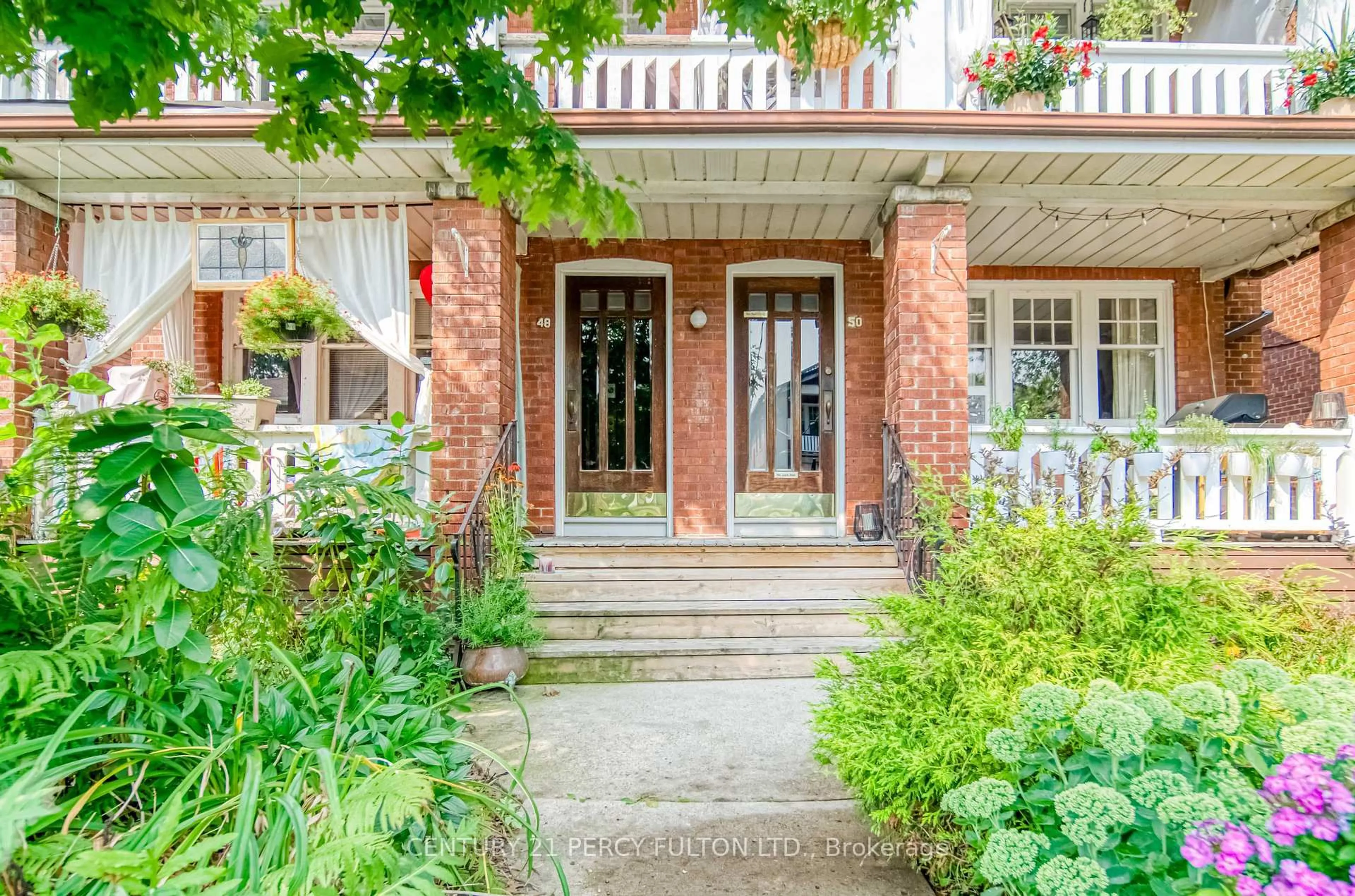 Home with brick exterior material, street for 48-50 Scarboro Beach Blvd, Toronto Ontario M4E 2X1