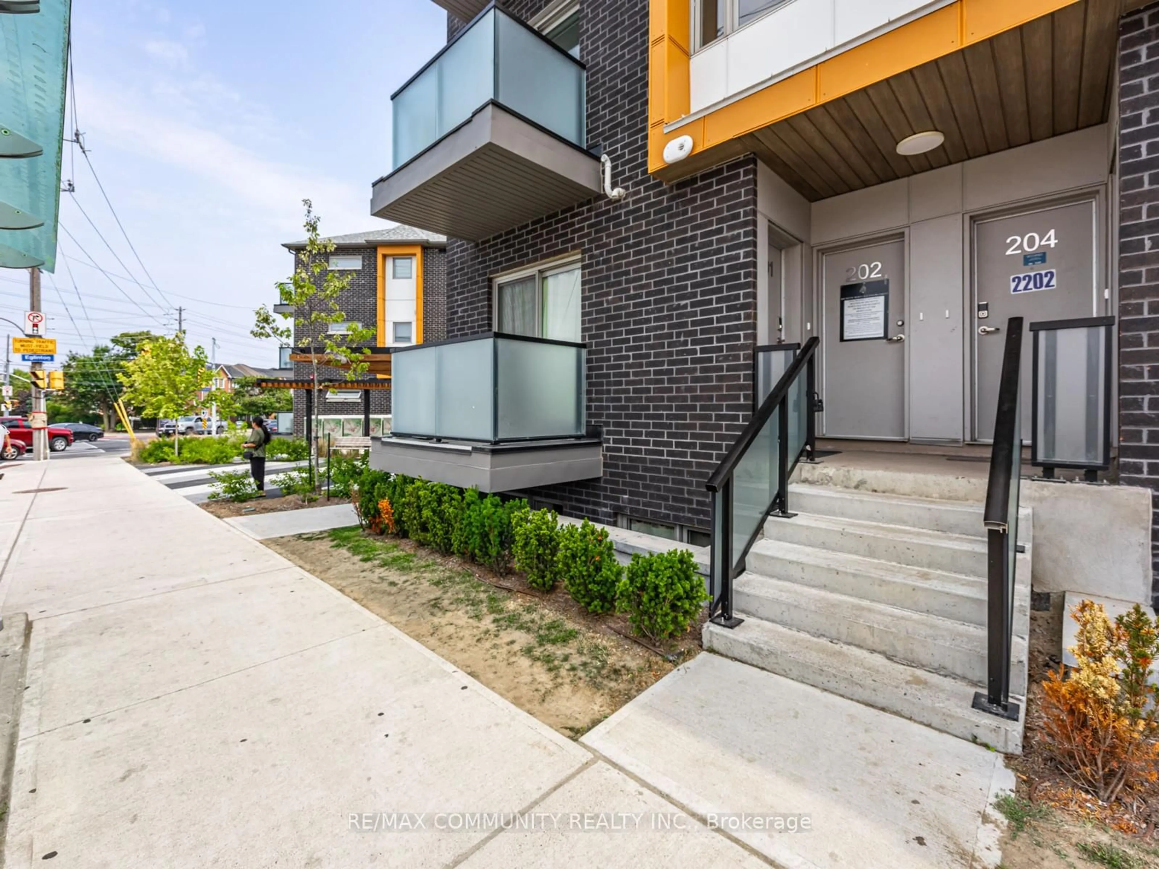 Home with brick exterior material, street for 1085 Danforth Rd #202, Toronto Ontario M1J 0B2