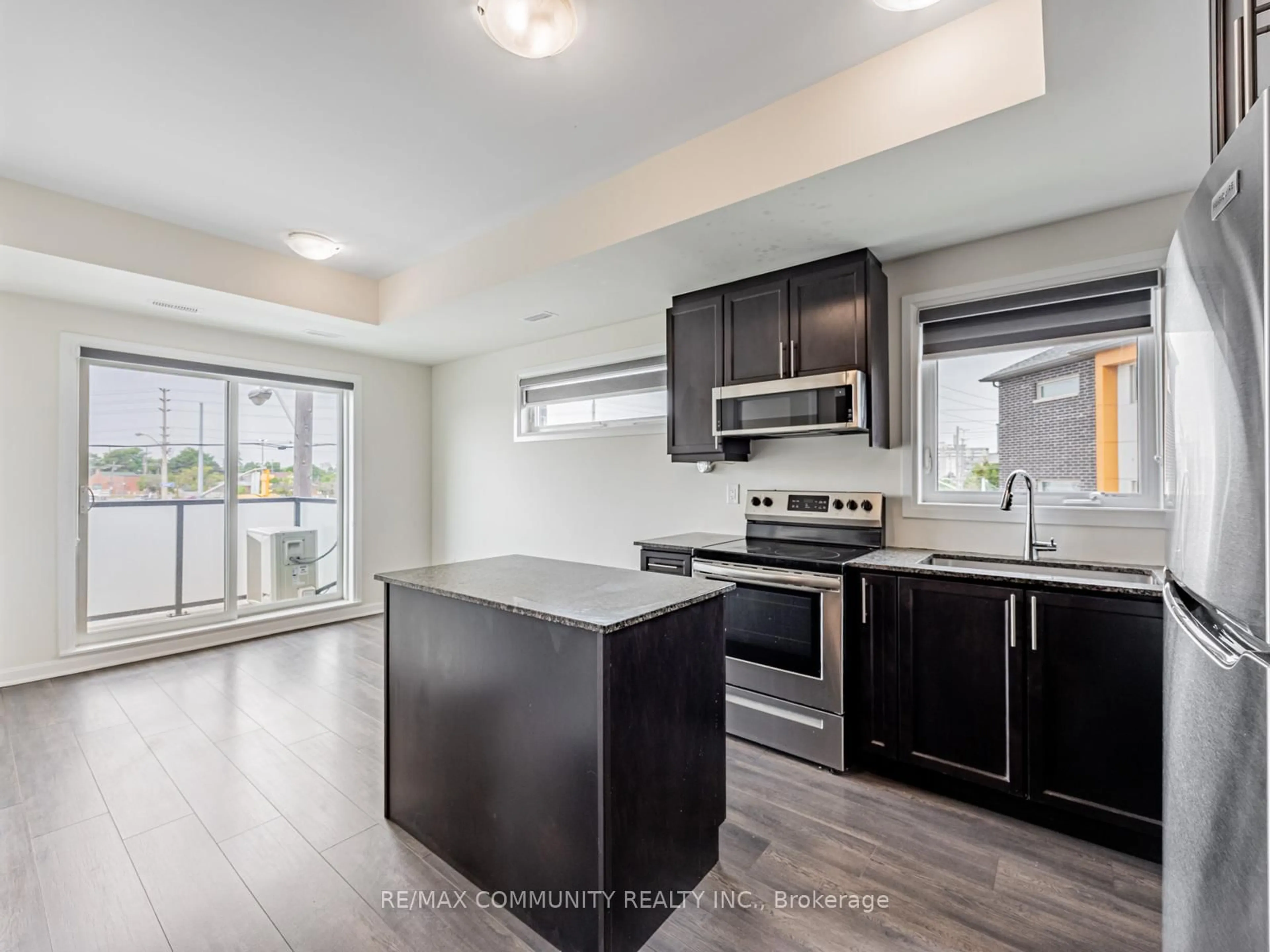 Open concept kitchen, unknown for 1085 Danforth Rd #202, Toronto Ontario M1J 0B2