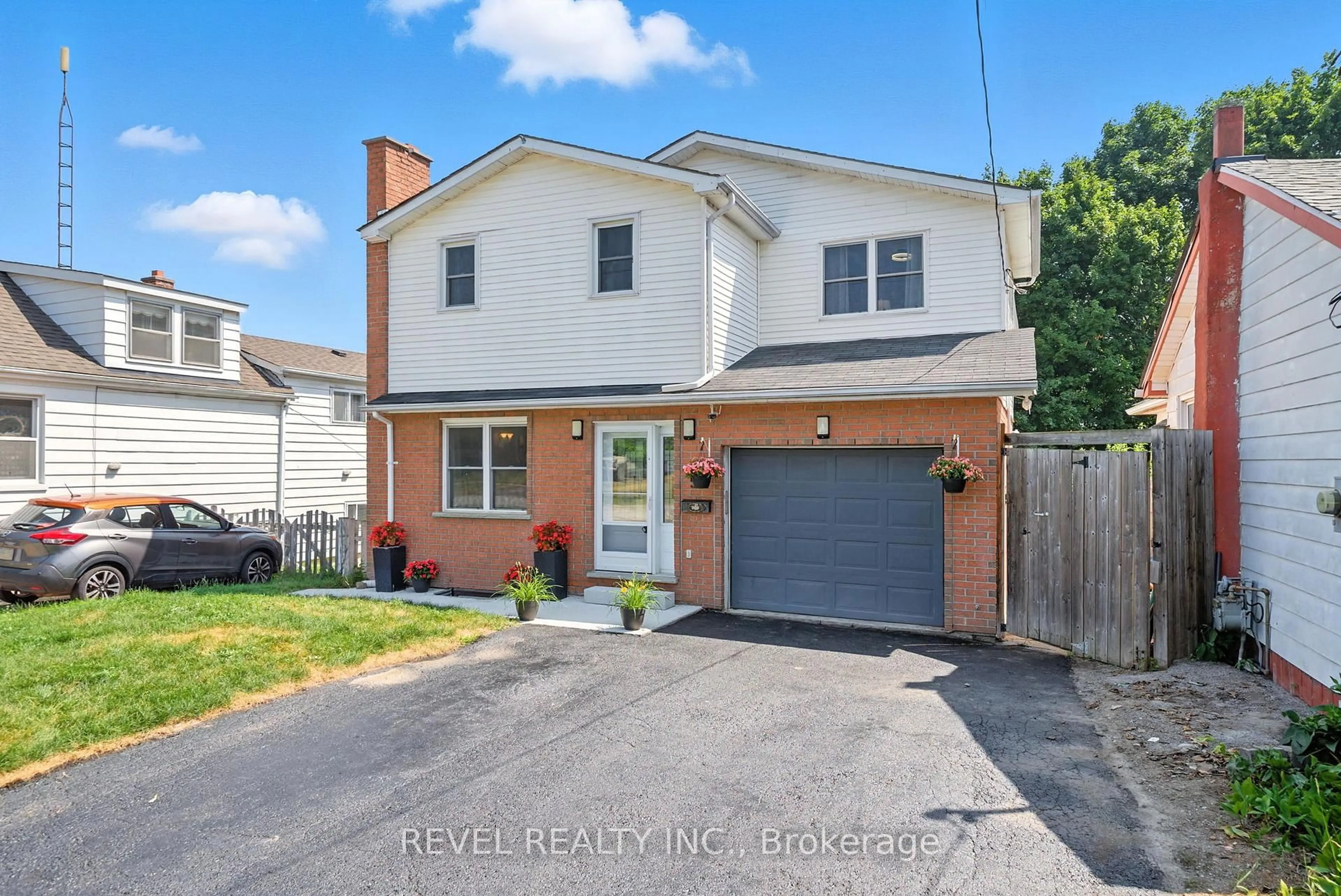 Home with brick exterior material, street for 57 Rosehill Blvd, Oshawa Ontario L1J 5G6