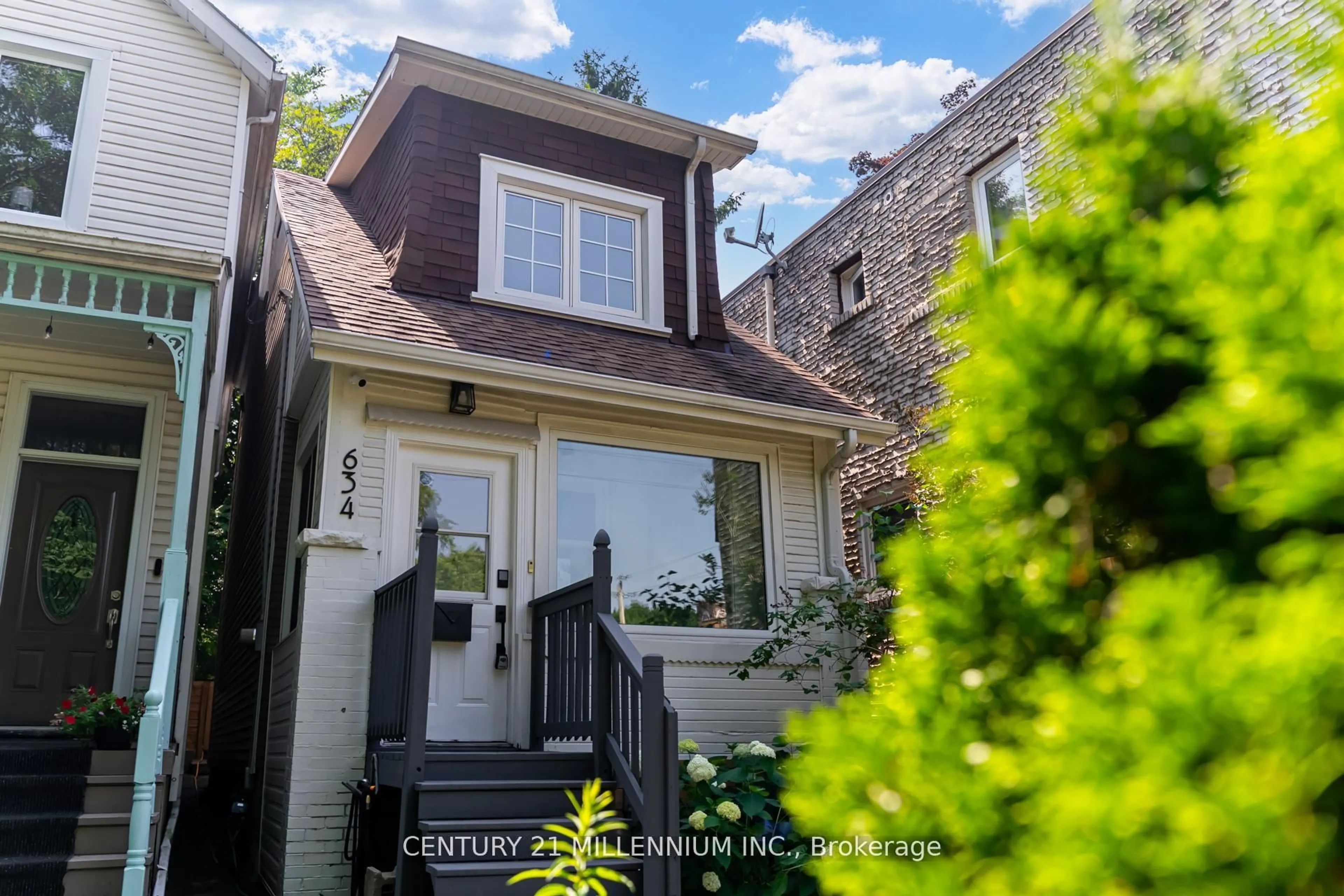 Home with brick exterior material, street for 634 Woodbine Ave, Toronto Ontario M4E 2J1