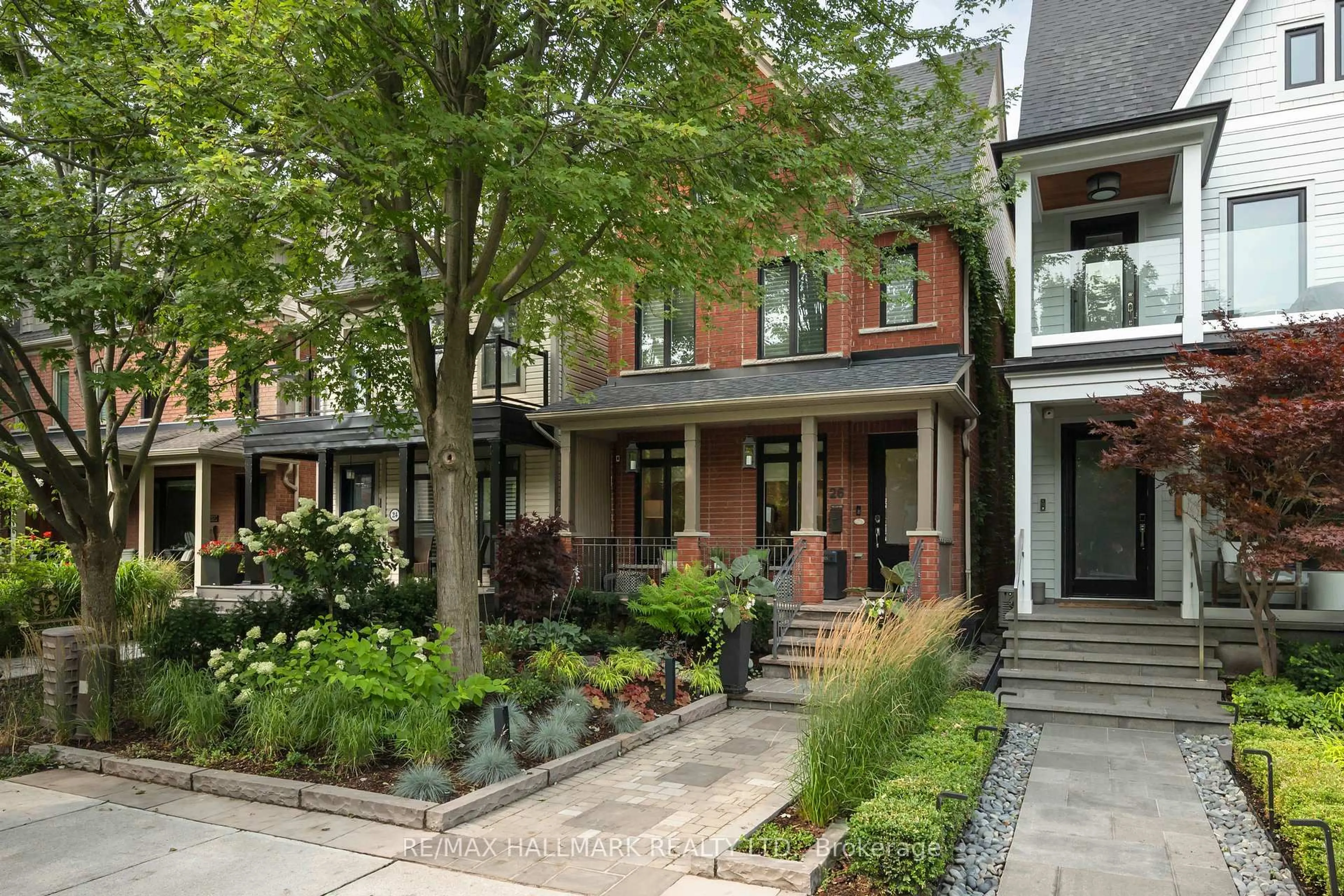 Home with brick exterior material, street for 26 Winners Circ, Toronto Ontario M4L 3Z7