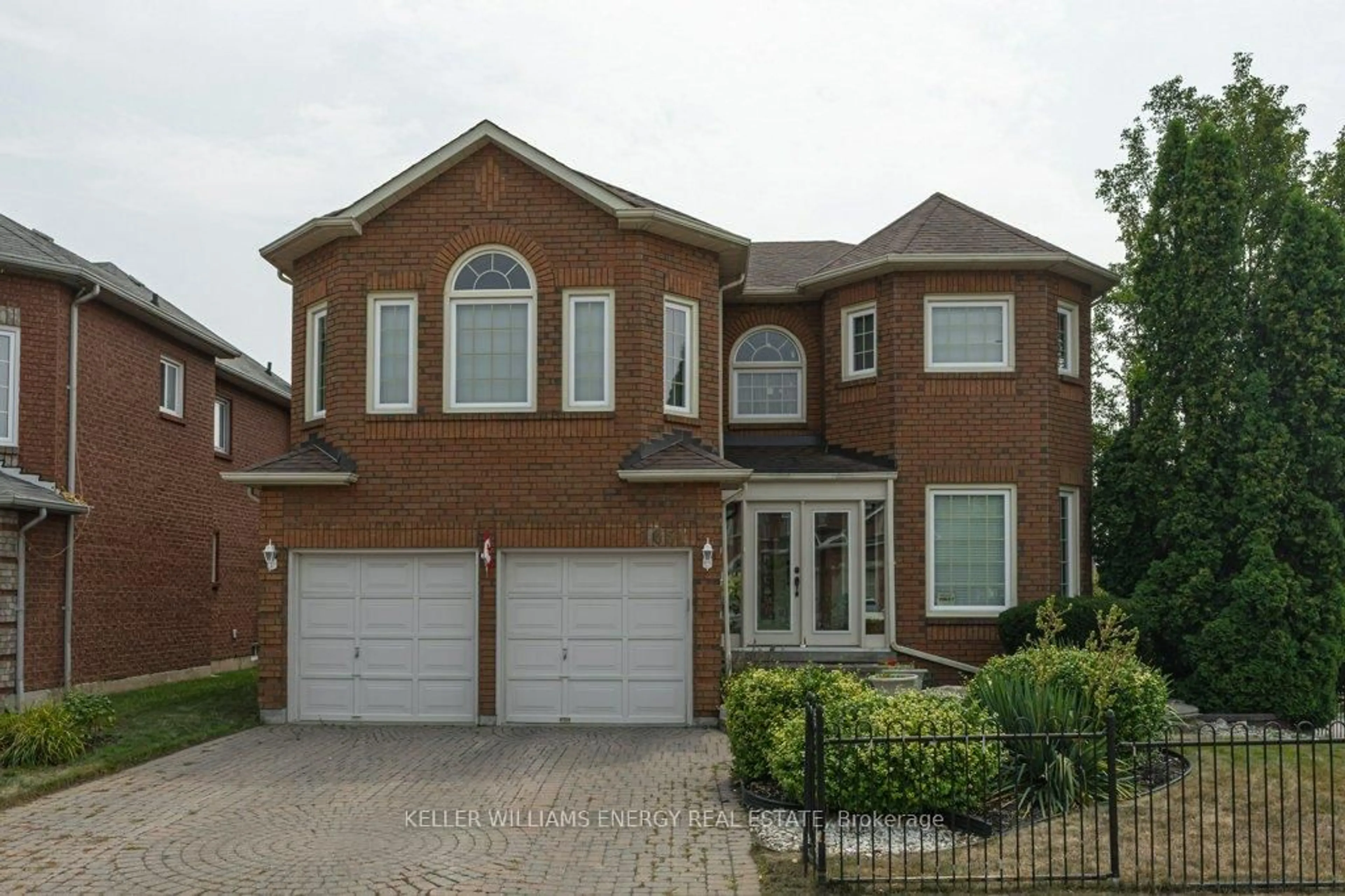 Home with brick exterior material, street for 1651 Major Oaks Rd, Pickering Ontario L1X 2G4
