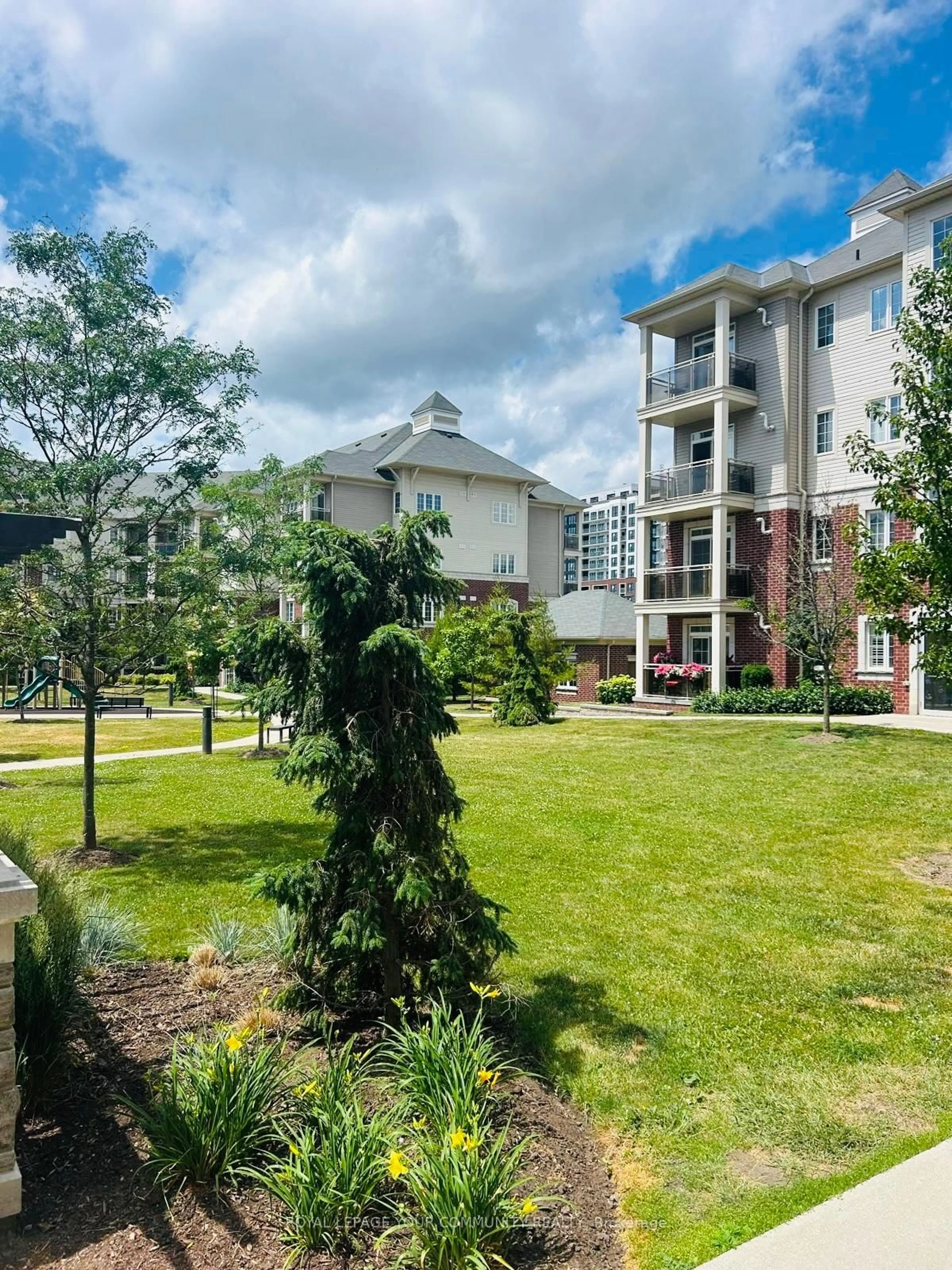 A pic from outside/outdoor area/front of a property/back of a property/a pic from drone, unknown for 80 Aspen Springs Dr #102, Clarington Ontario L1C 0V4