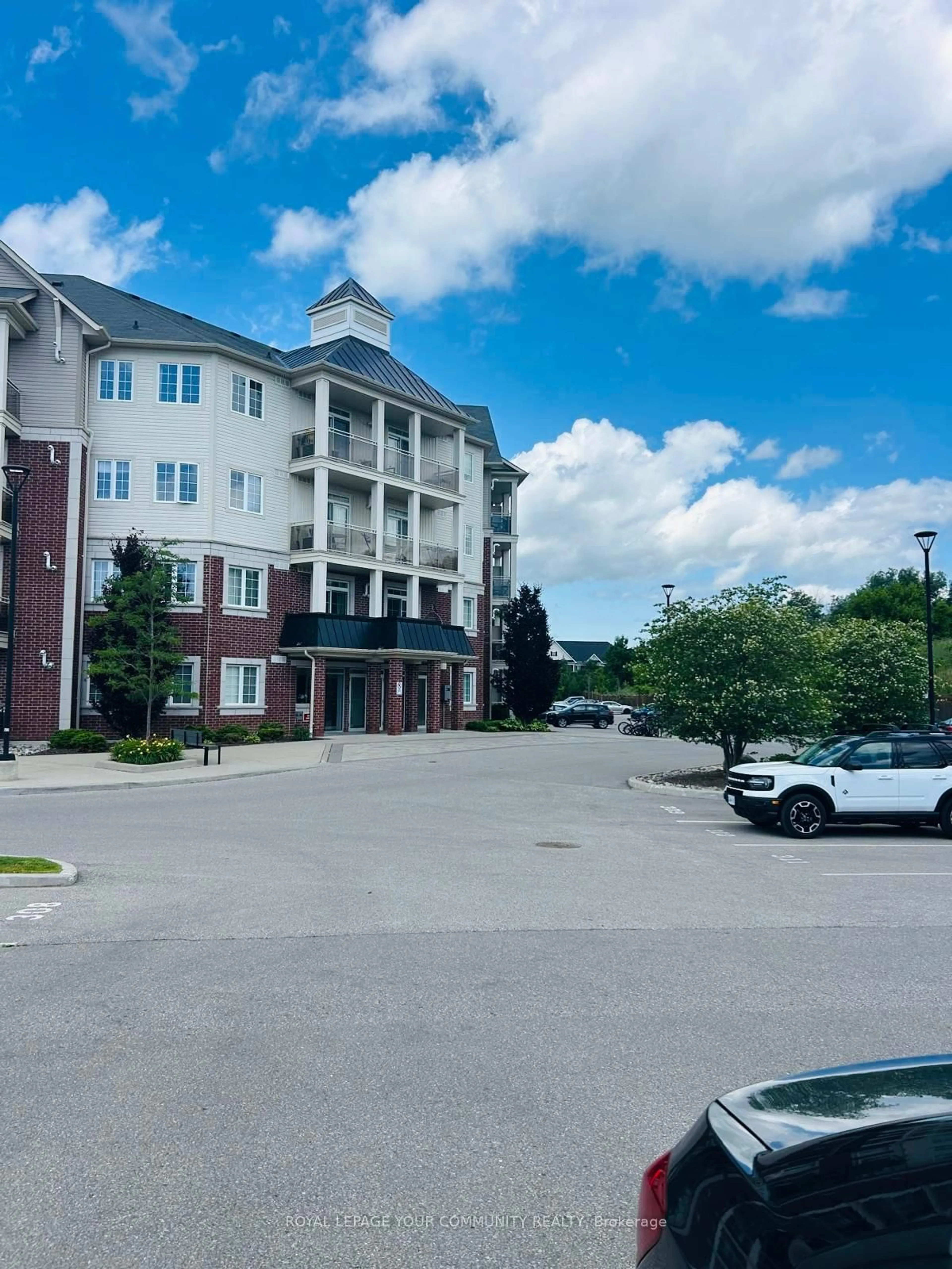 A pic from outside/outdoor area/front of a property/back of a property/a pic from drone, unknown for 80 Aspen Springs Dr #102, Clarington Ontario L1C 0V4
