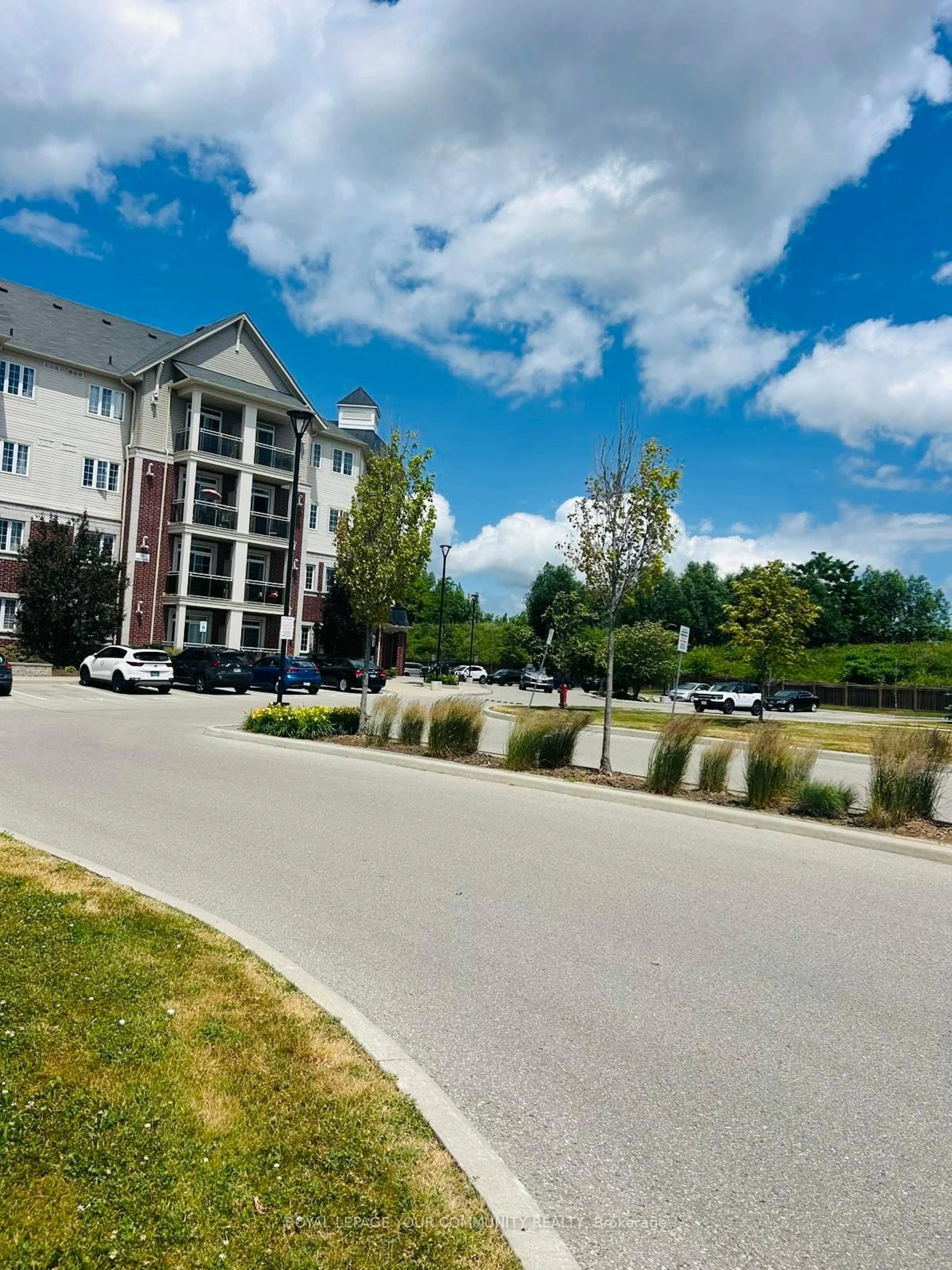 A pic from outside/outdoor area/front of a property/back of a property/a pic from drone, water/lake/river/ocean view for 80 Aspen Springs Dr #102, Clarington Ontario L1C 0V4