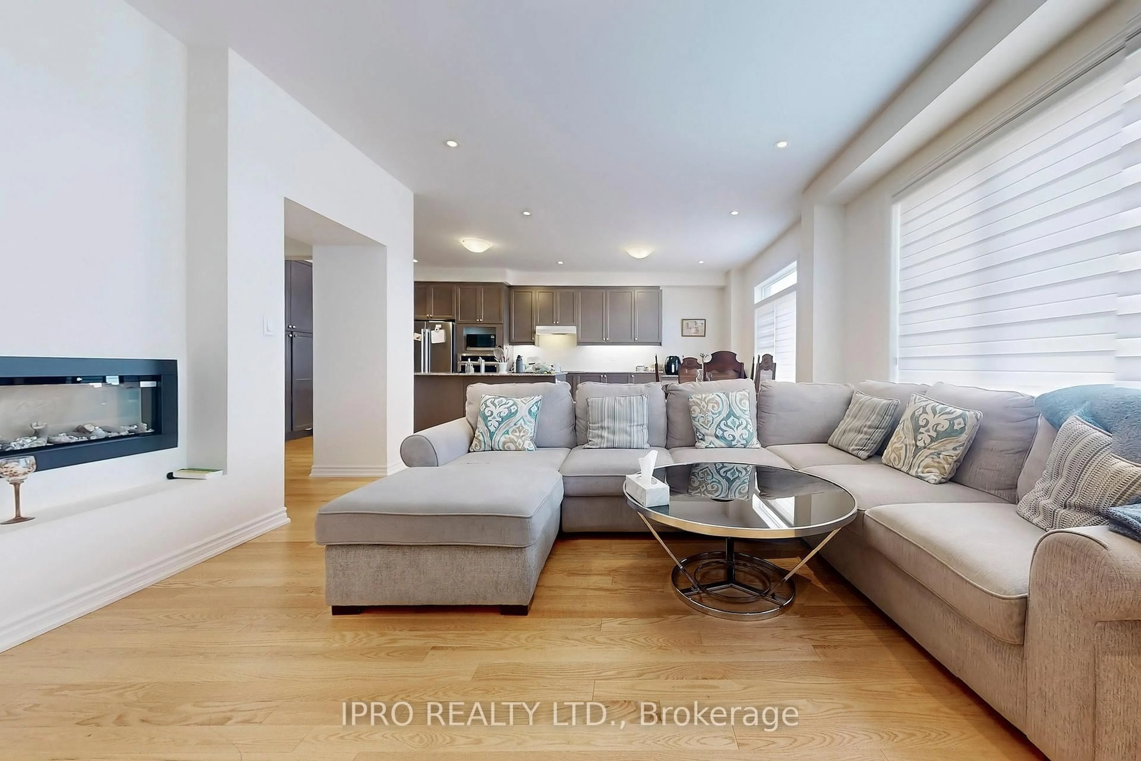 Living room with furniture, wood/laminate floor for 905 Rexton Dr, Oshawa Ontario L1L 0T1
