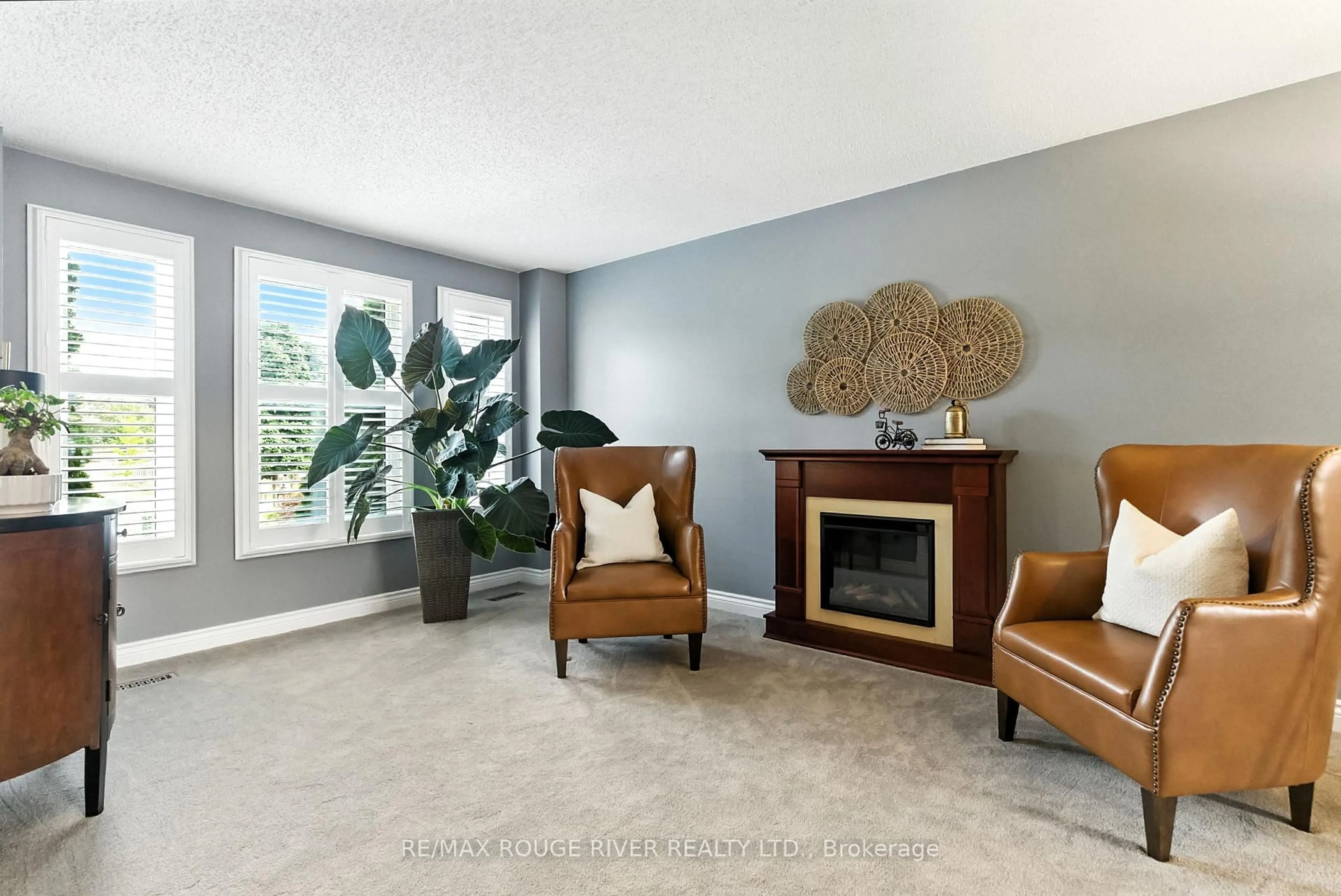 Living room with furniture, ceramic/tile floor for 12 Limestone Cres, Whitby Ontario L1N 8N8