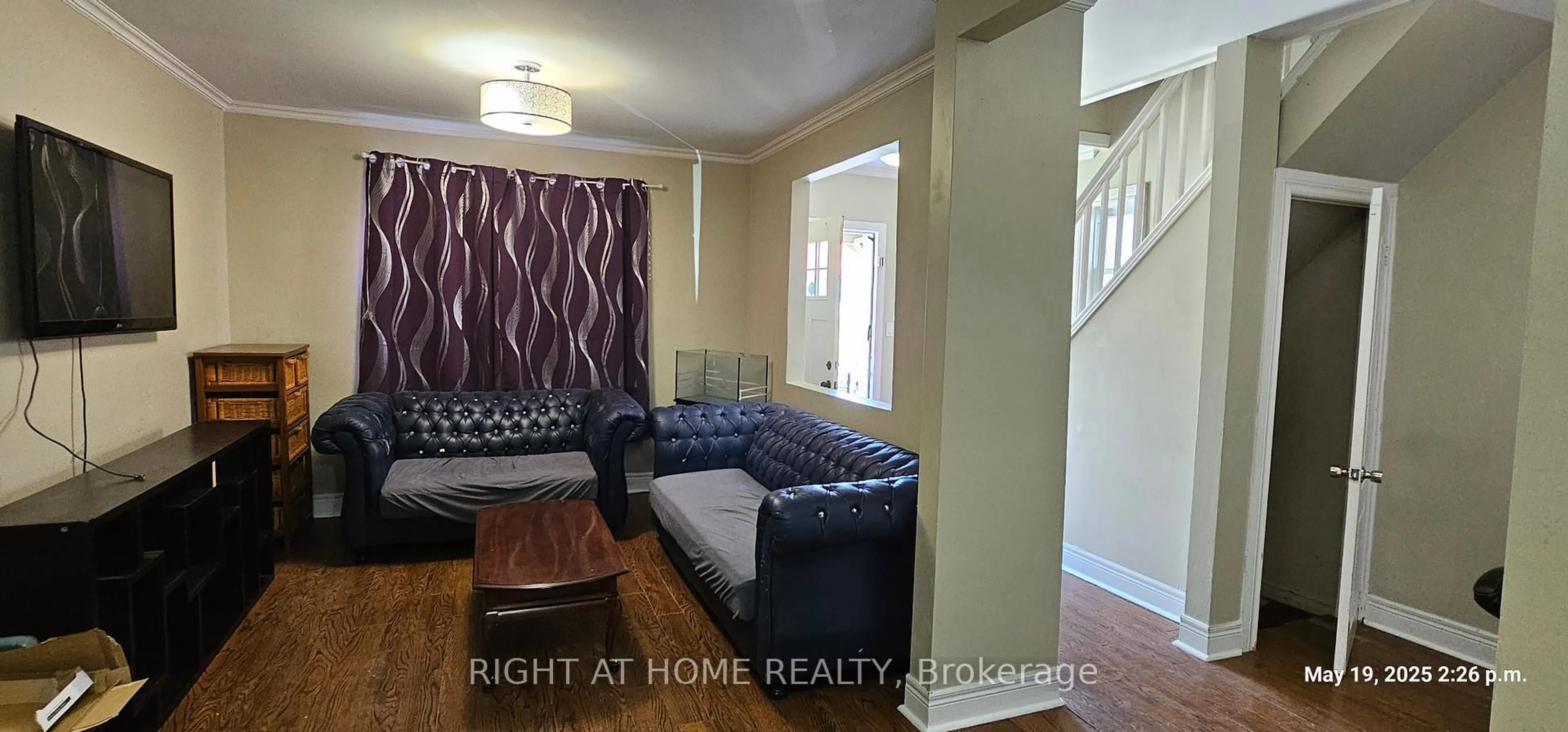 Living room with furniture, wood/laminate floor for 313 Olive Ave, Oshawa Ontario L1H 2P5