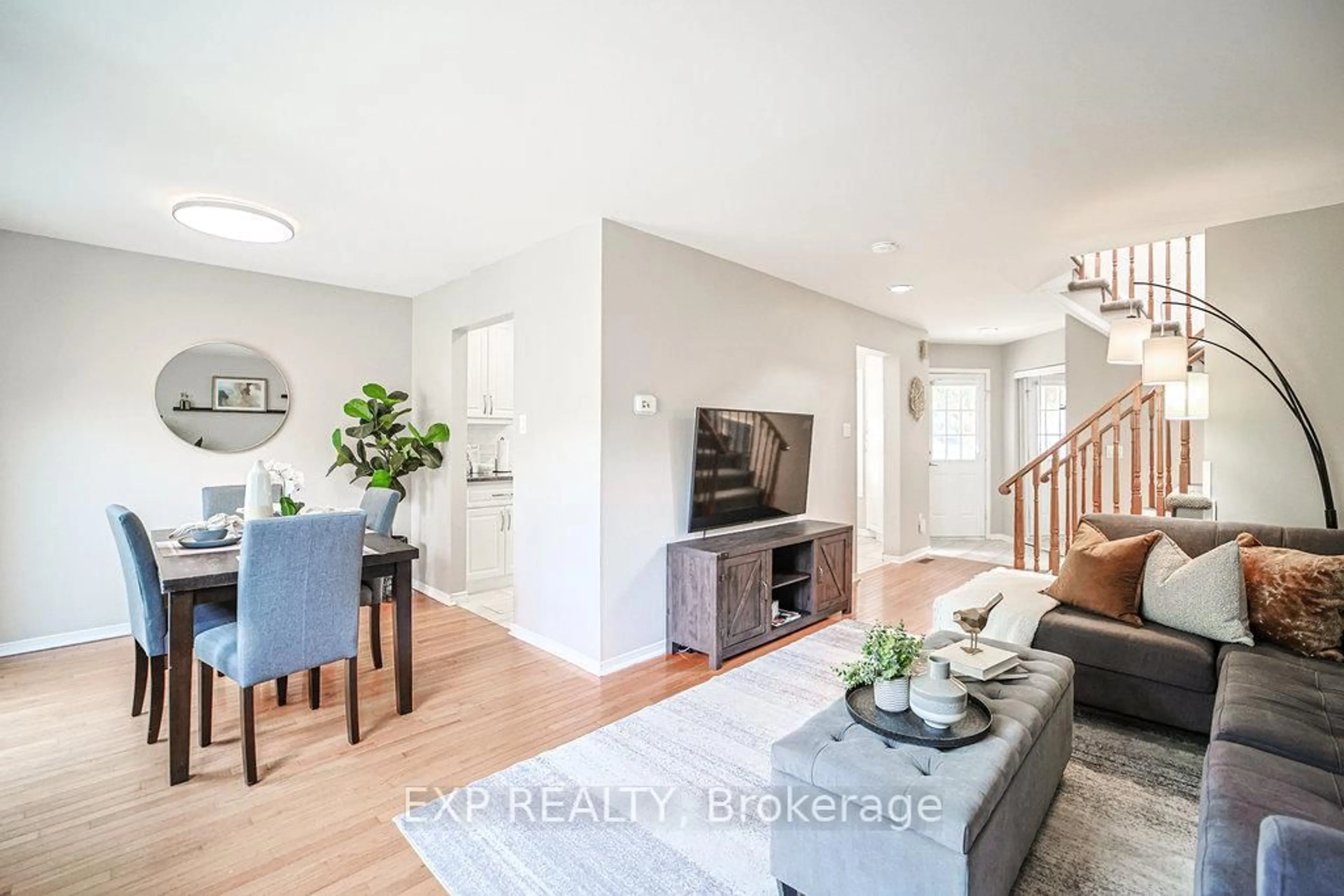 Living room with furniture, wood/laminate floor for 130 Chatfield Dr, Ajax Ontario L1T 2J3