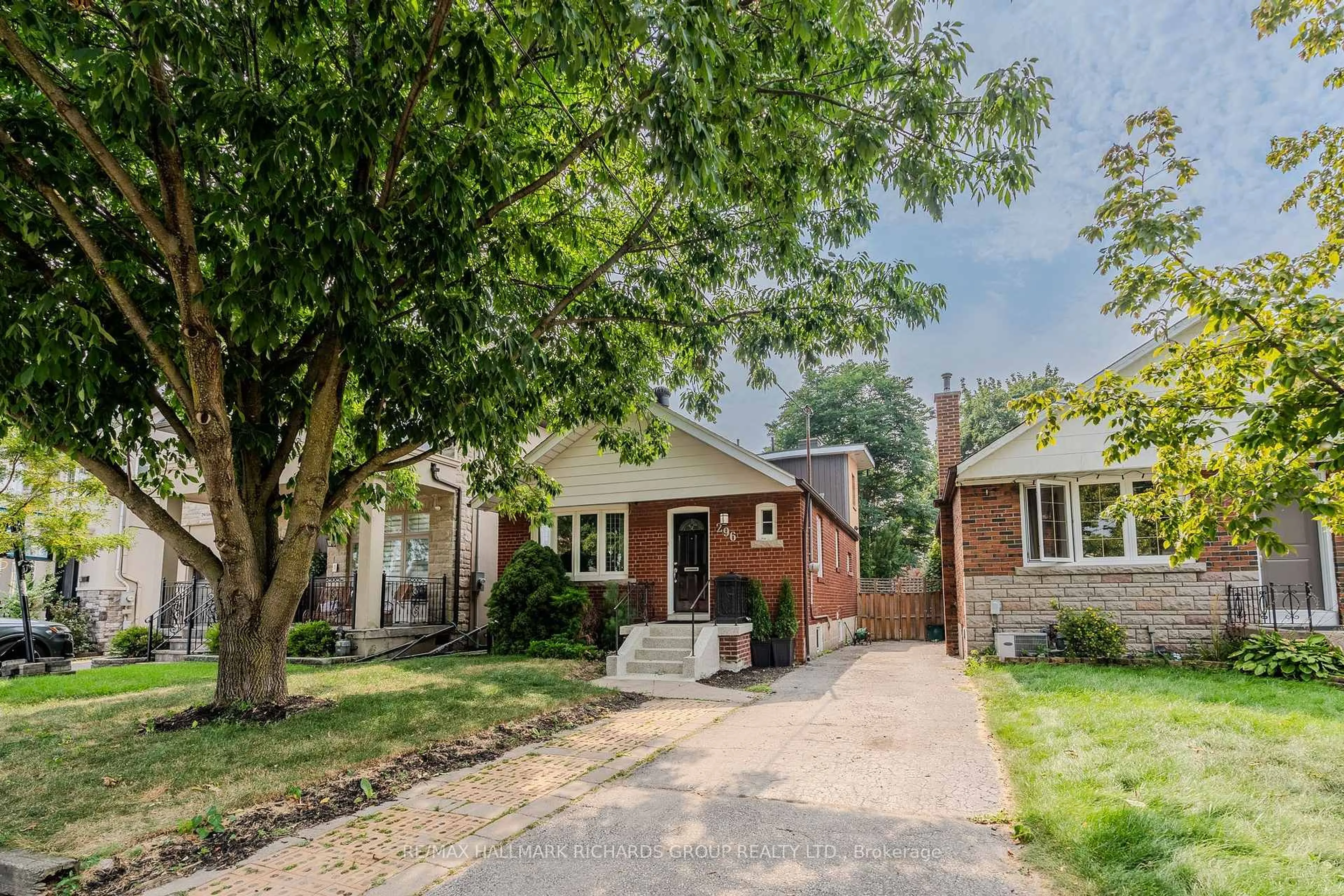 Home with brick exterior material, street for 296 Linsmore Cres, Toronto Ontario M4J 4L9