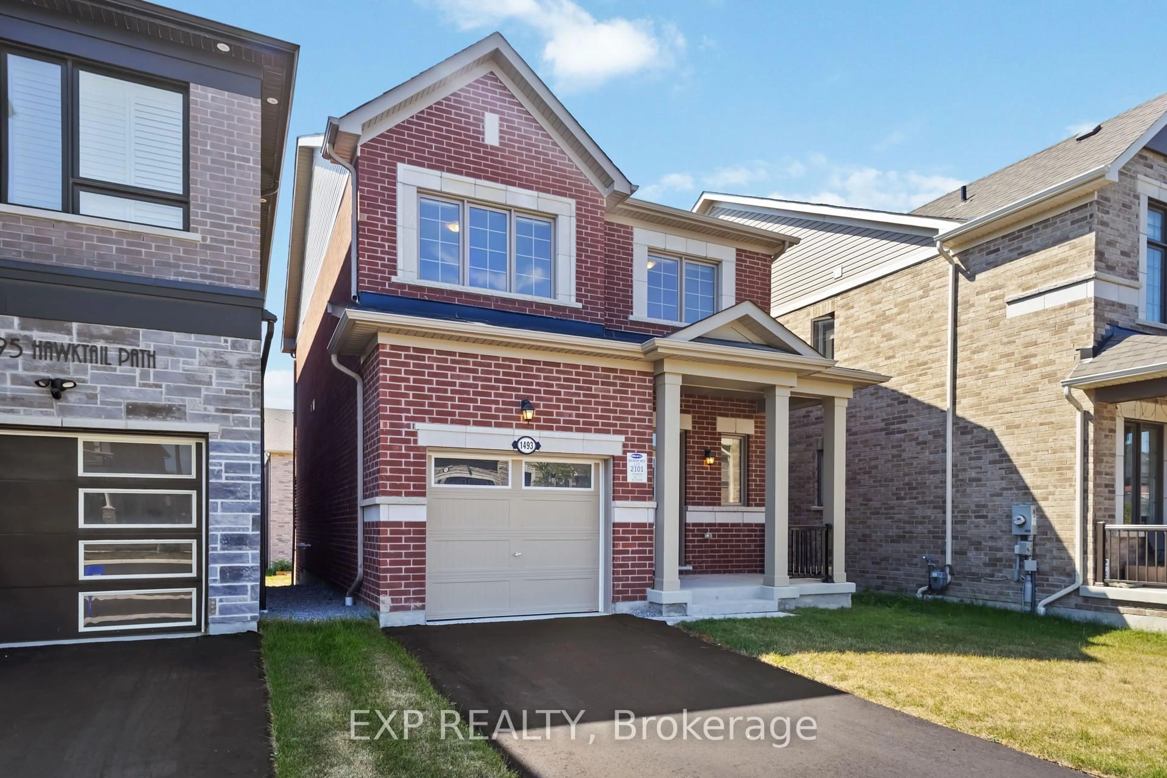 Home with brick exterior material, street for 1493 HAWKTAIL Path, Pickering Ontario L1X 0N9