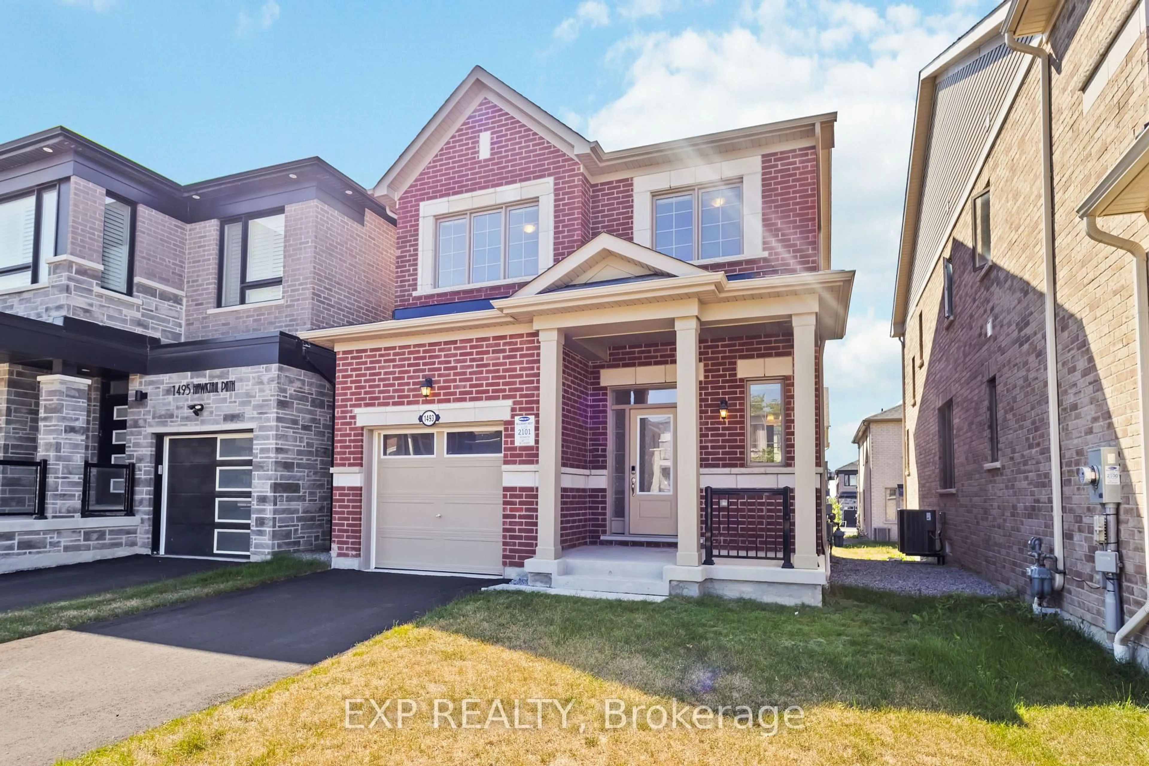 Home with brick exterior material, street for 1493 HAWKTAIL Path, Pickering Ontario L1X 0N9