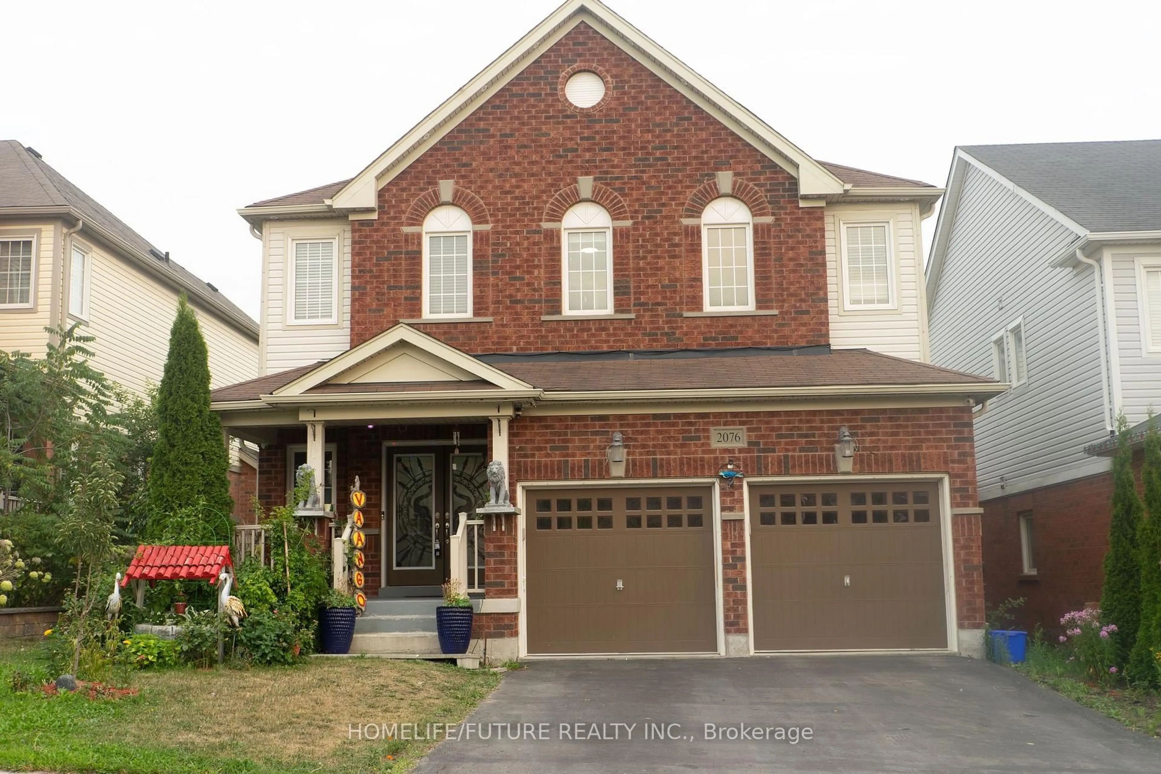Home with brick exterior material, street for 2076 Queensbury Dr, Oshawa Ontario L1K 0S1