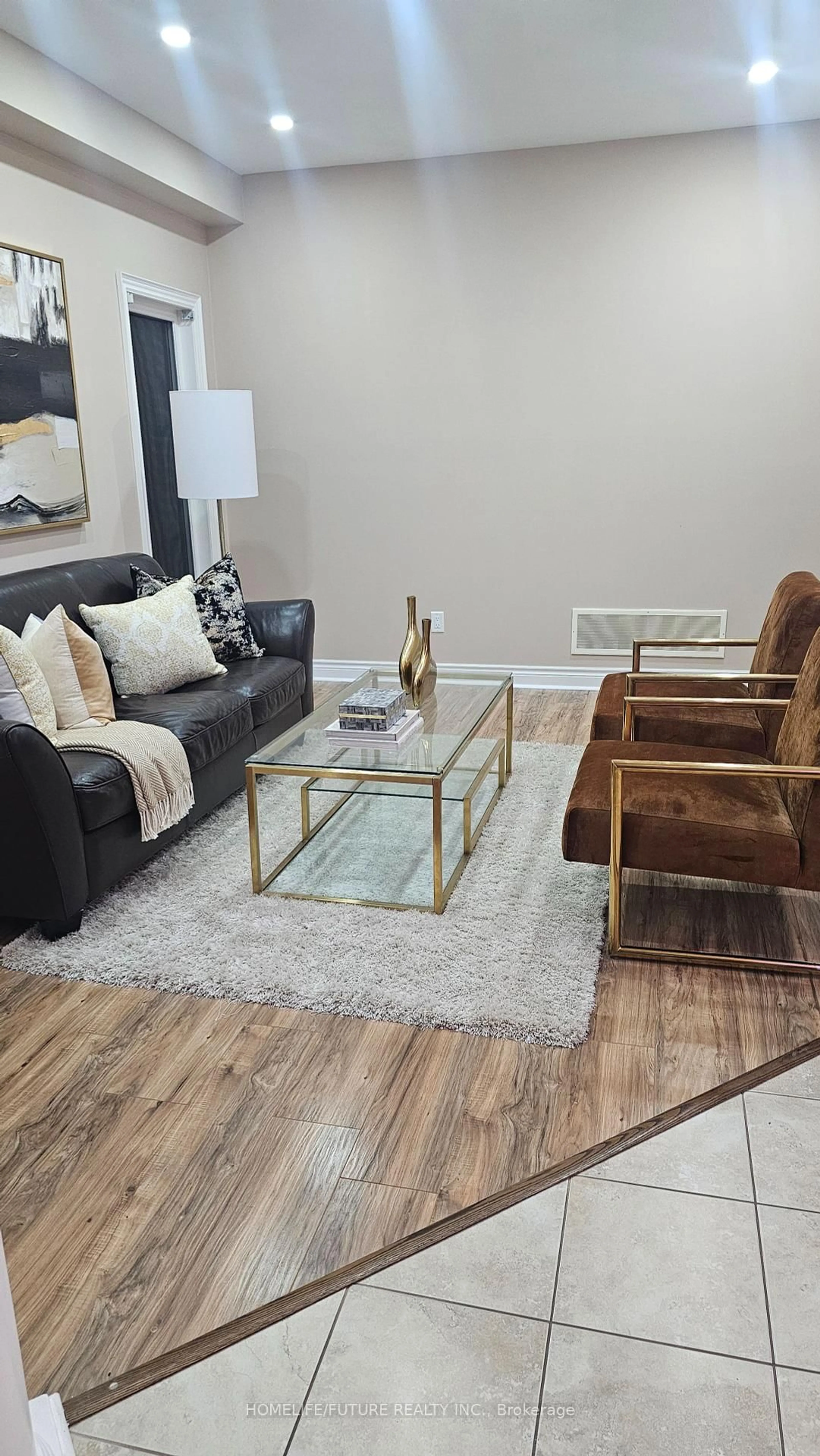 Living room with furniture, wood/laminate floor for 2076 Queensbury Dr, Oshawa Ontario L1K 0S1